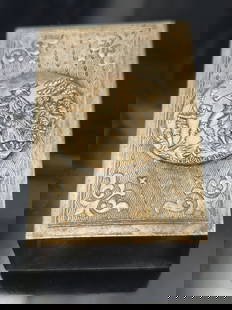 Vintage Silver Plated Matchbox Holder 37.2g: Vintage silver-plated matchbox holder with raised scenic medallion depicting a colonial or 18th-century-style scene, surrounded by an engraved wave pattern and scroll flourishes. Rectangular form with