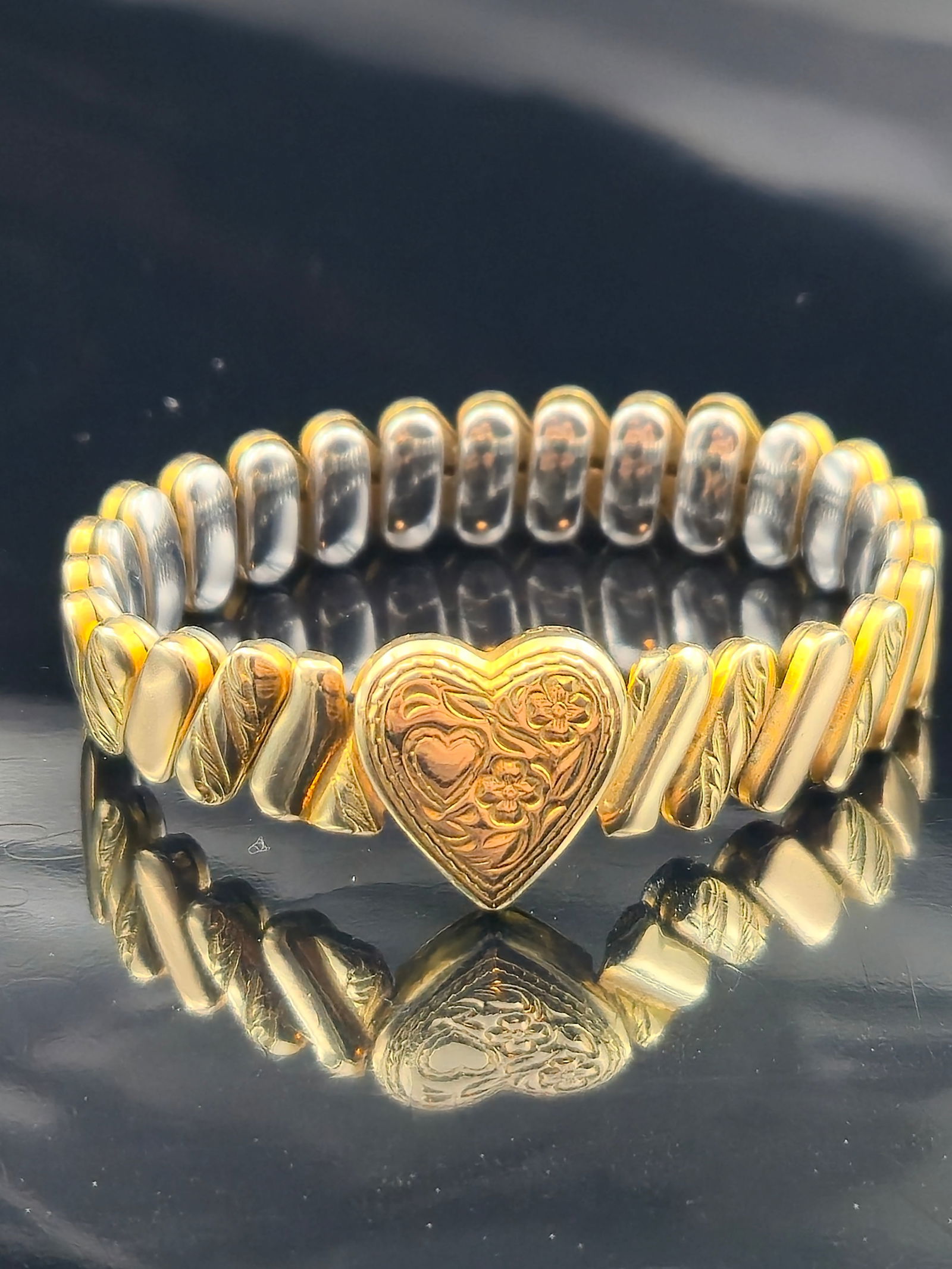 Bellavance 12K Gold Filled Expansion Bracelet w/ Etched Heart, 12.7g: Vintage expansion stretch bracelet by Bellavance Inc., crafted in 12K gold filled. The bracelet features an ornate etched heart centerpiece with floral detailing, complemented by alternating gold-tone