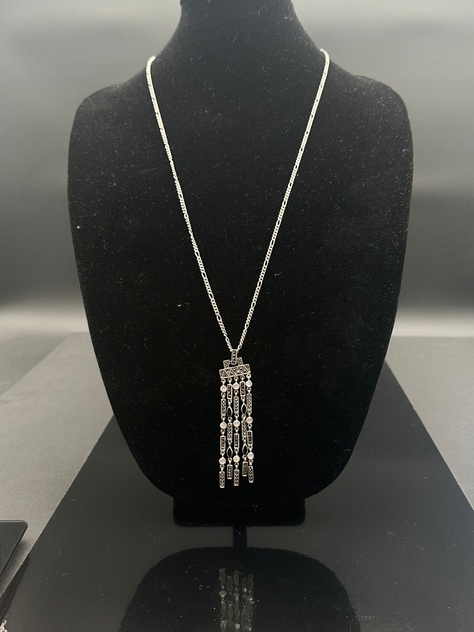 TV Mexican Sterling Silver Fringe Necklace & Earring Set, Marked 925: A striking vintage Mexican sterling silver jewelry set, consisting of a necklace and matching earrings. The design features long articulated fringe drops with geometric silver elements and circular ac