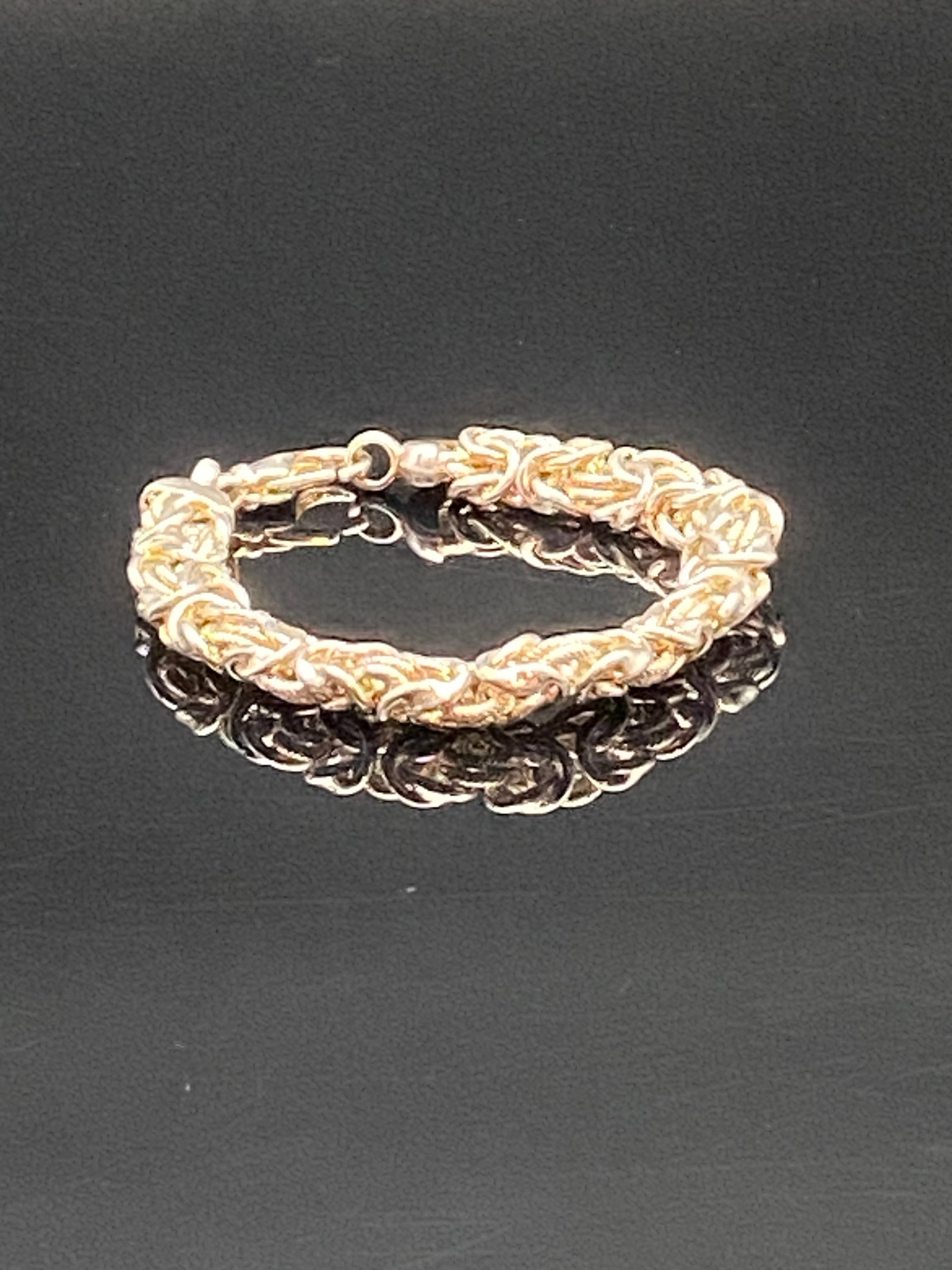 Milor Italy Sterling Silver 925 Byzantine Link Bracelet: An elegant Byzantine link bracelet crafted in sterling silver (marked 925), designed by Milor, Italy. This bracelet showcases intricate interwoven links with a bold yet refined look, making it a timel