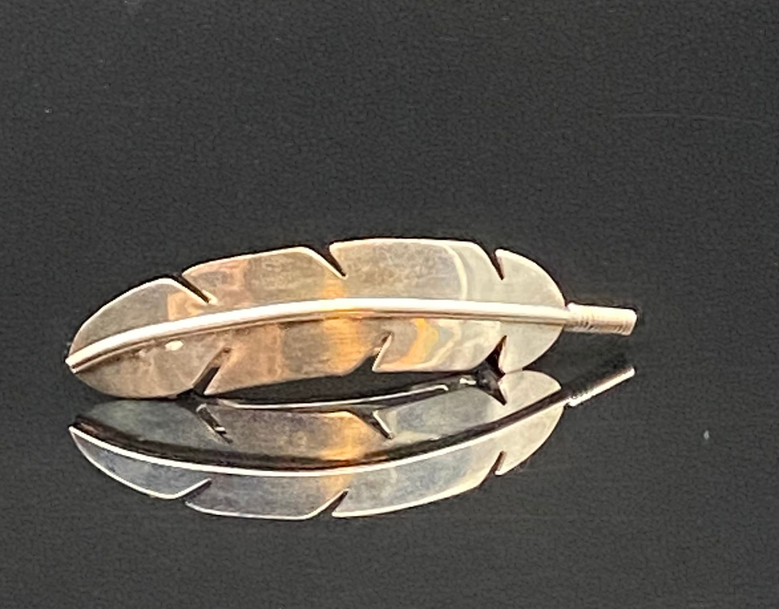 Vintage French Sterling Silver Feather Hair Clip: Beautifully crafted vintage sterling silver hair clip in the form of a delicate feather, stamped Made in France. The fine engraving and graceful design highlight French craftsmanship, while the secure