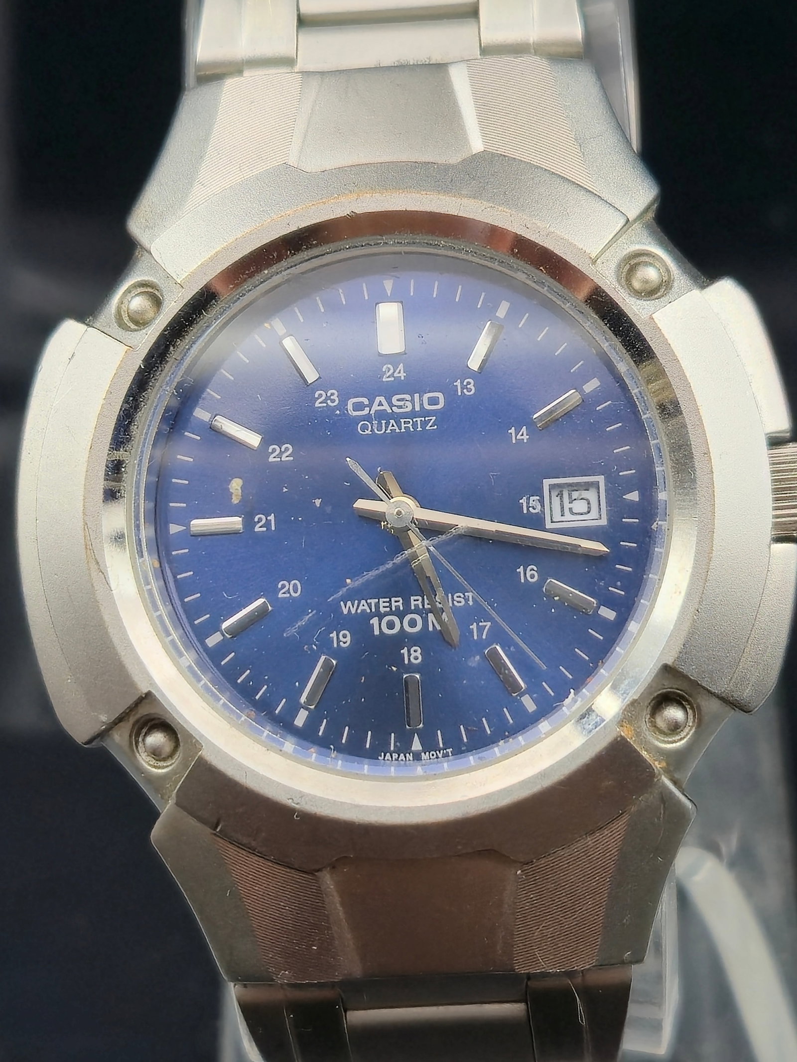 Casio MTP-3036 Stainless Steel Blue Dial Quartz Watch 100M: Casio men’s quartz wristwatch, reference MTP-3036, featuring a blue sunburst dial with applied indices, luminous hands, 24-hour inner scale, and date window at 3 o’clock. Stainless steel case with