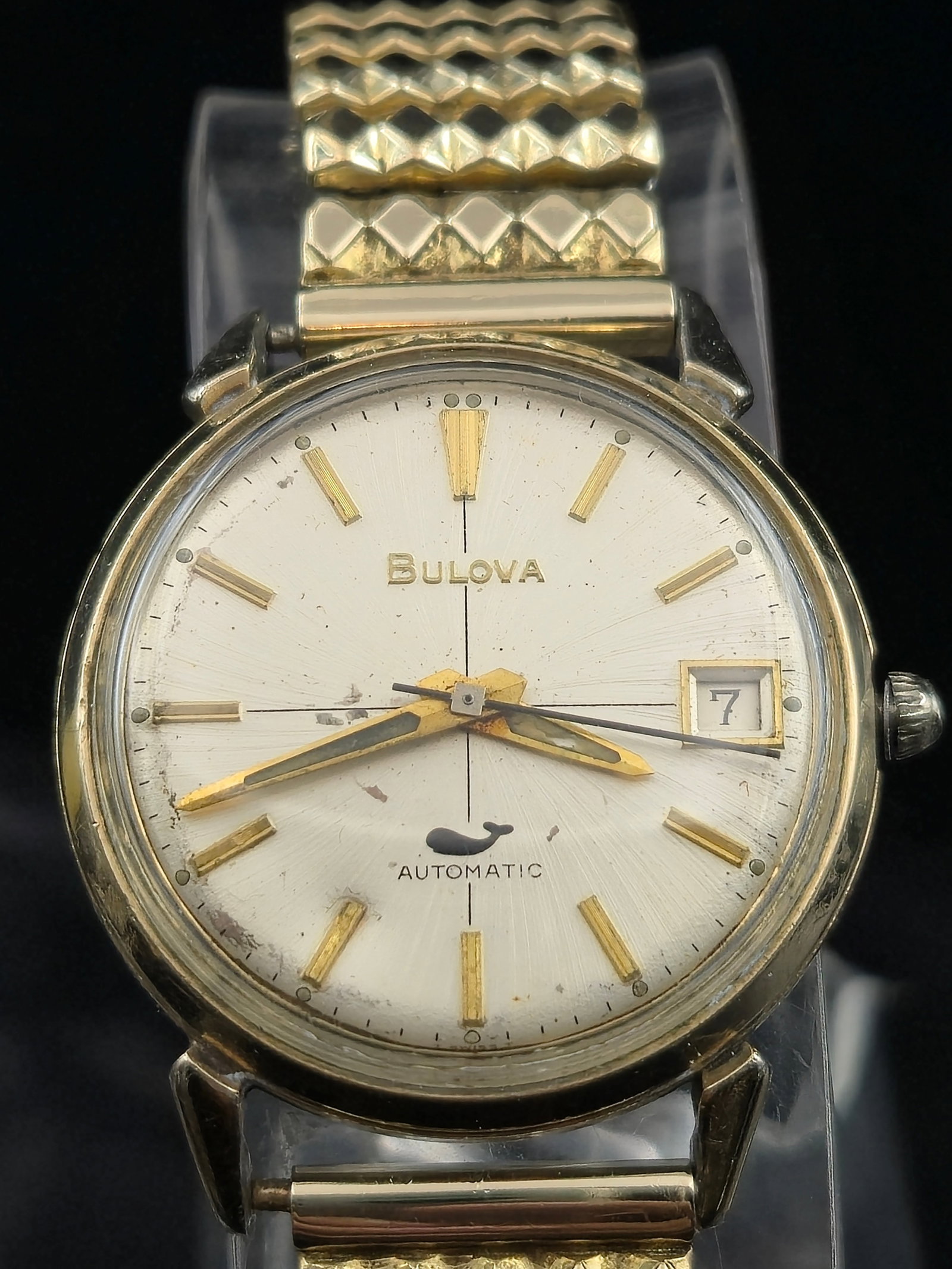 Bulova 1971 Automatic Whale Dial 17J Cal. 11ANACD 33mm Running: Vintage Bulova automatic wristwatch, circa 1971 (caseback marked N1), with gold-tone case featuring 10K RGP bezel and stainless steel back. Case measures approx. 33.1mm excluding crown.Silver sunburst