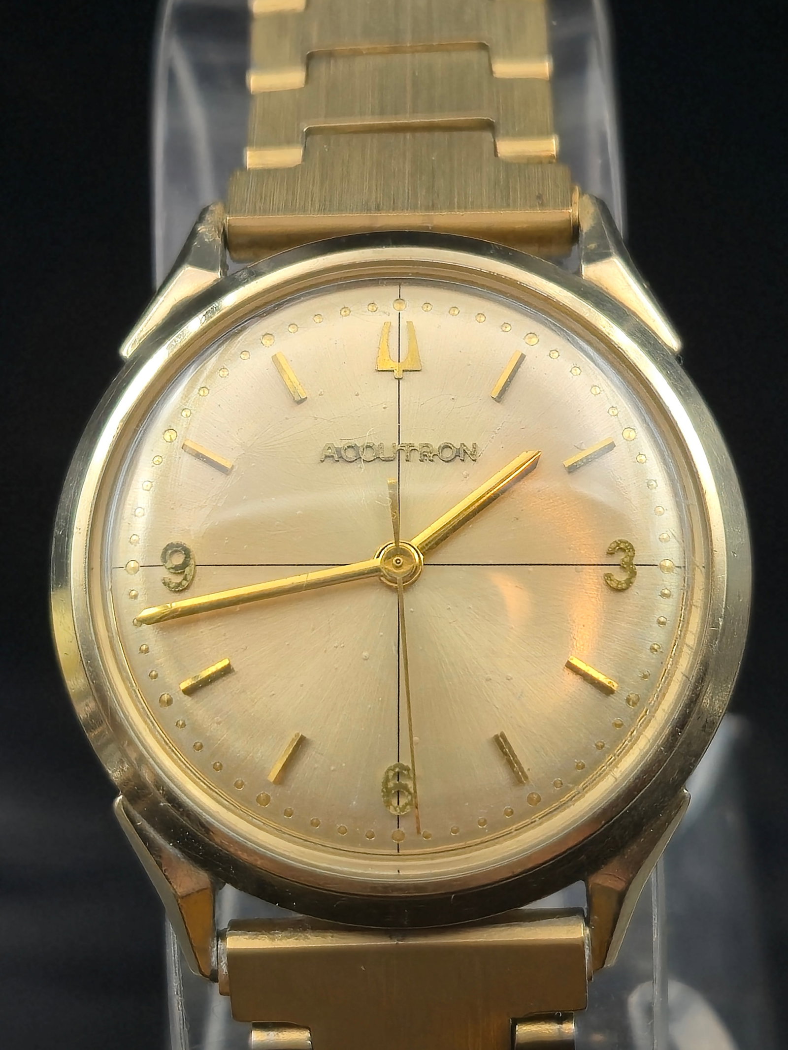 1965 Bulova Accutron 214 10K GF Bezel Tuning Fork Watch, Running: Vintage 1965 Bulova Accutron wristwatch with the pioneering tuning fork movement, caliber 214. Gold-tone dial with applied markers and sub-second track, signed Accutron with tuning fork logo at 12. Ca