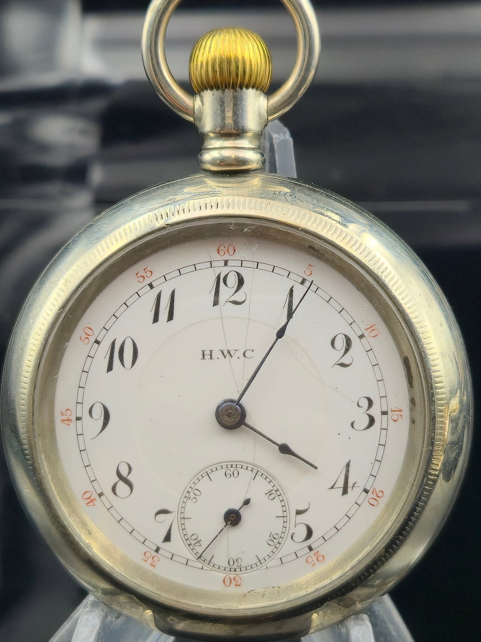 Swiss H.W.C. 21J Adjusted Pocket Watch c.1910 Silverode Case: Antique Swiss pocket watch signed H.W.C. with 21-jewel gilt damaskeened movement, serial #816527, adjusted to 3 positions, marked “Heat & Cold.” Features gold jewel settings, ruby jewels, and 
