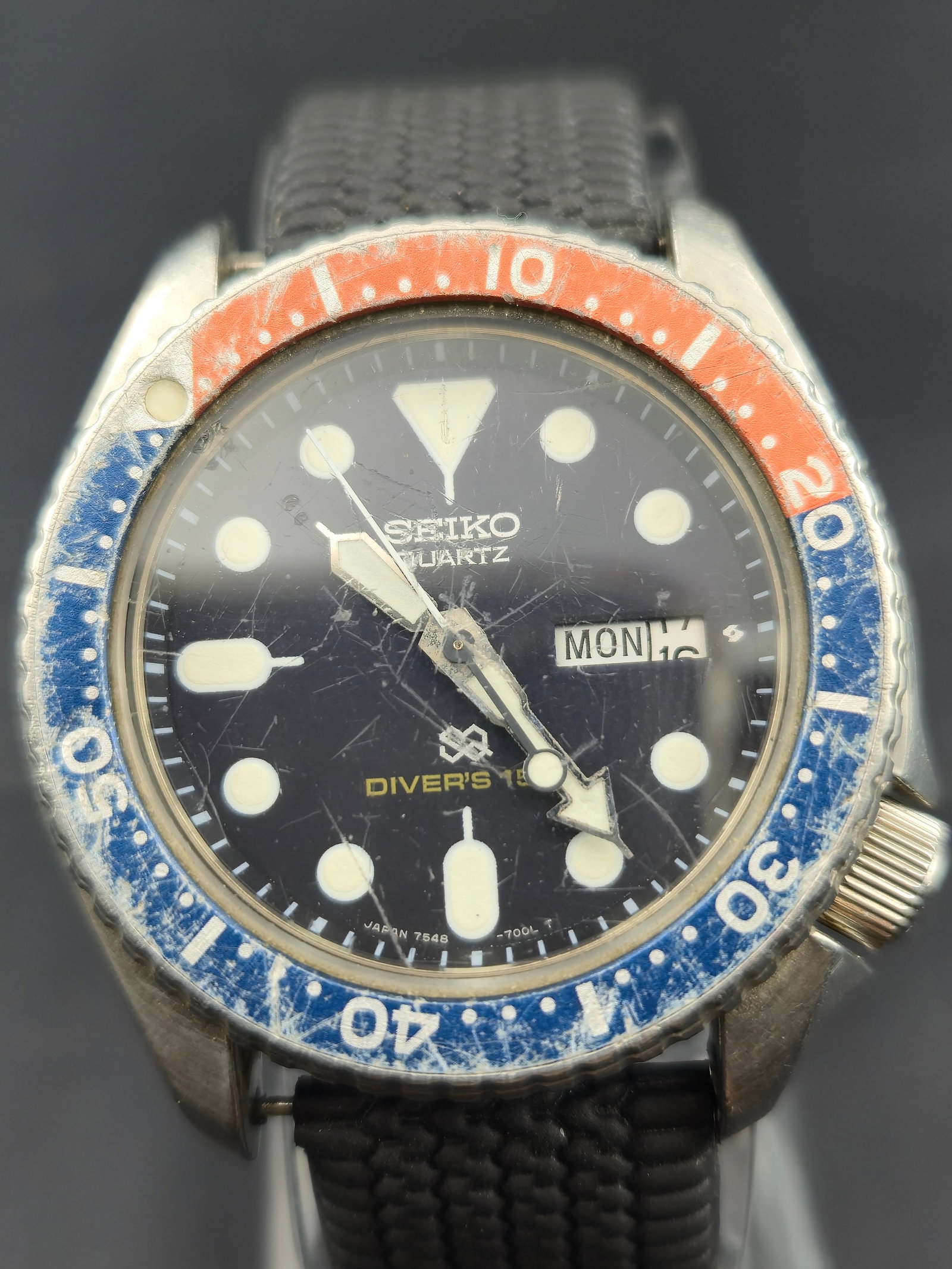 Seiko 7548-700L “Pepsi” Diver’s 150m Quartz Watch, 1985, w/ Original Box & Strap: Vintage Seiko Diver’s 150m wristwatch, reference 7548-700L, produced January 1985. Features a stainless steel case with screw-down crown and rotating red/blue “Pepsi” bezel. Black dial with