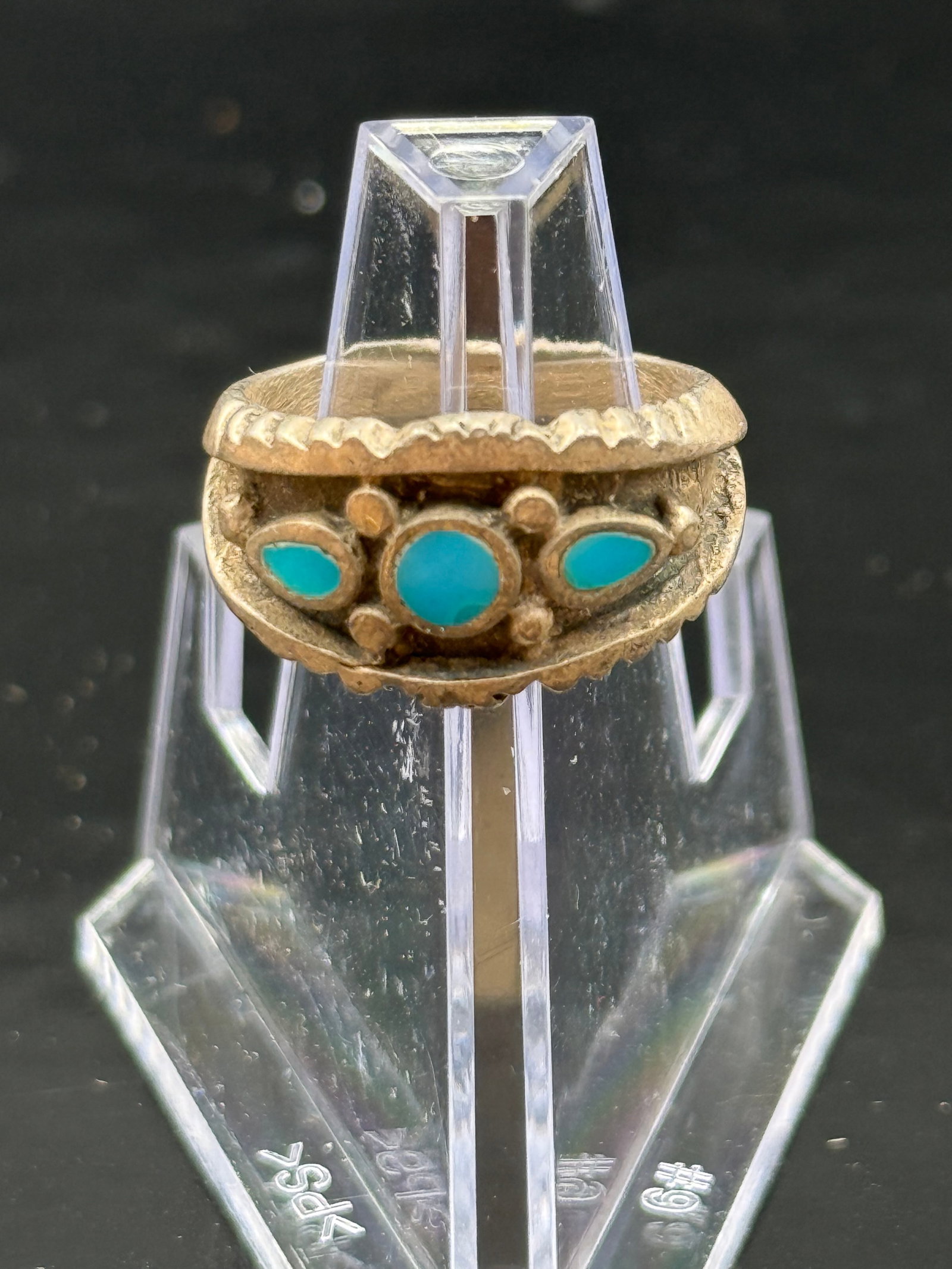 Turquoise Shadow Box Ring: Turquoise Shadow Box Ring, a distinctive style often associated with Native American jewelry, particularly from the Navajo and Zuni tribes.