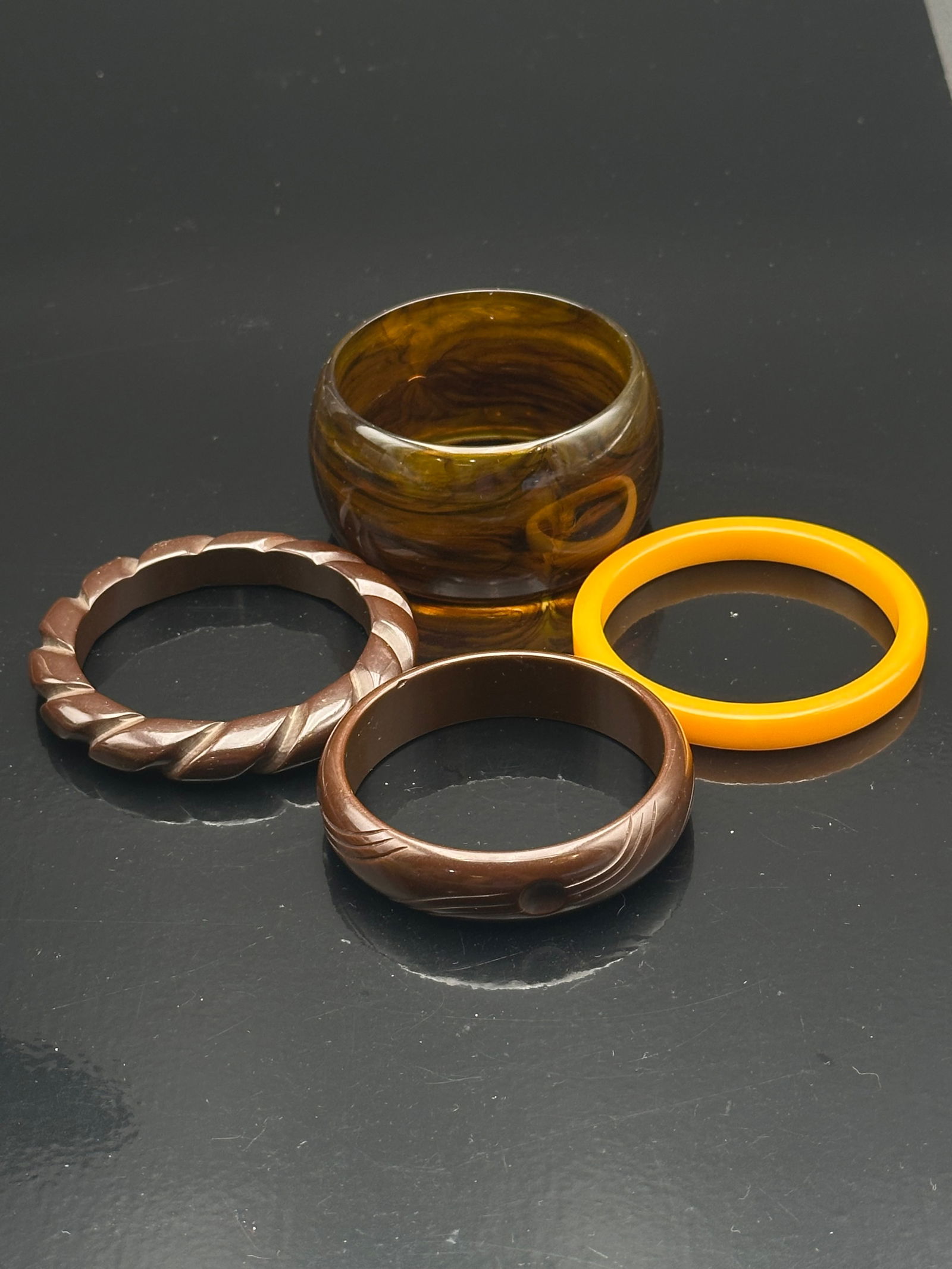 Set of 4 Vintage Bakelite Bangles – Swirled Brown, Yellow & Carved Designs (1 of 9)