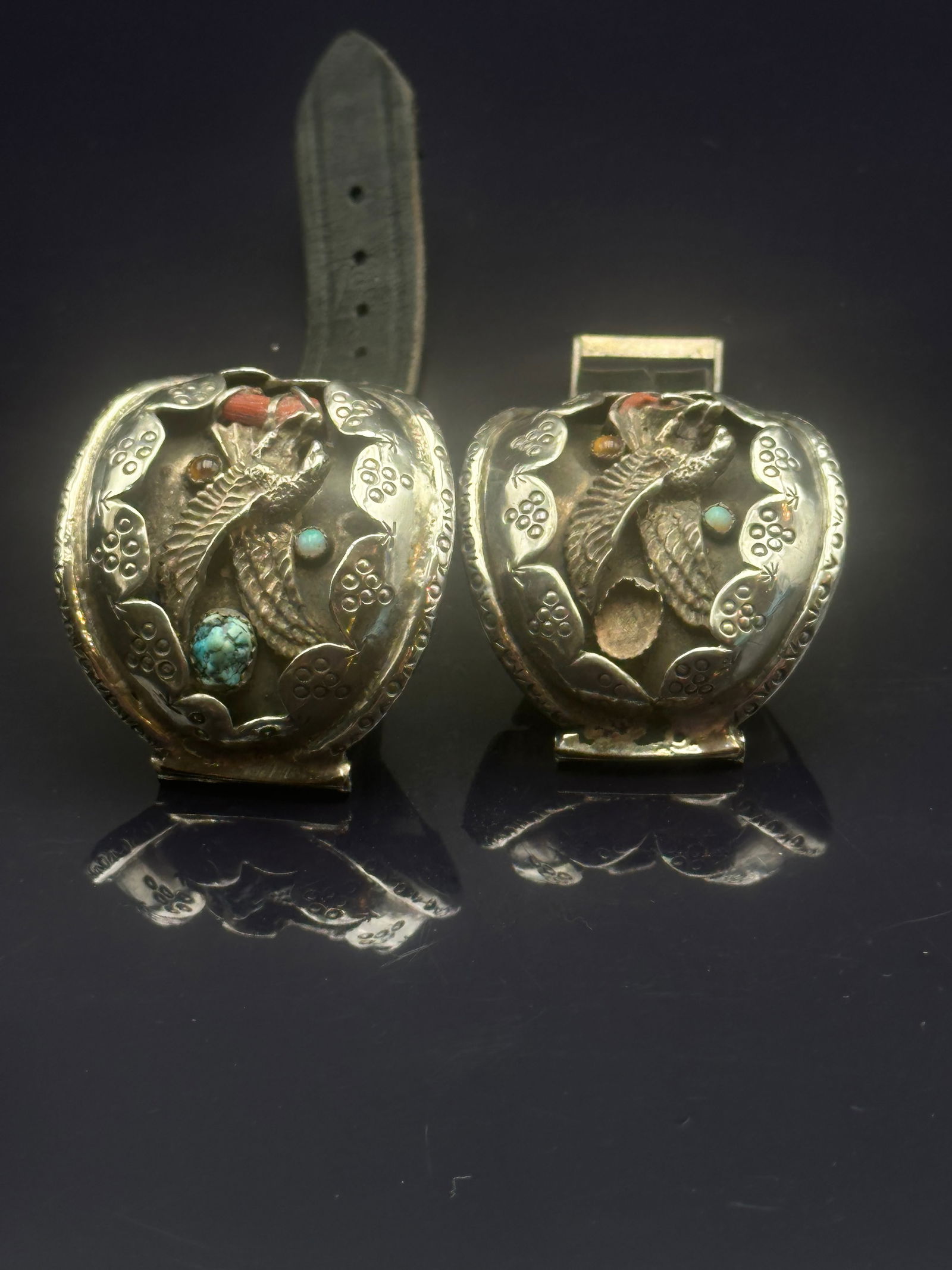 Navajo Sterling Silver “Dog Bone” Belt Buckle with Eagle Motif, Turquoise & Coral: Two-part Navajo sterling silver belt buckle set, known as the “Dog Bone” style, featuring stamped and scalloped designs with applied eagle figures and set with turquoise and coral cabochons. B