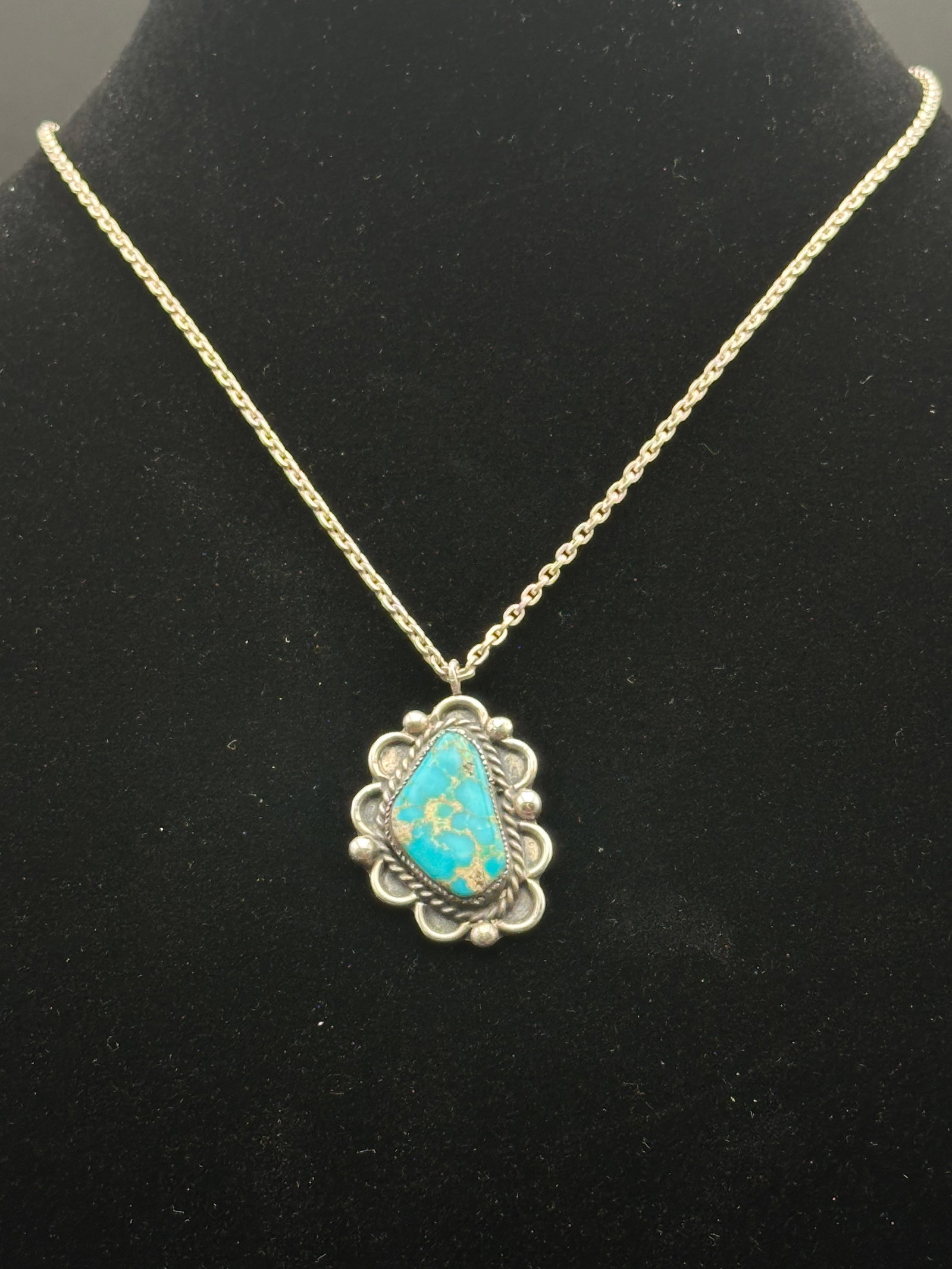 Sterling Silver Turquoise Pendant Necklace, 6g: Vintage sterling silver necklace featuring a natural turquoise cabochon in a scalloped bezel setting with silver bead accents. Total weight approx. 6 grams.