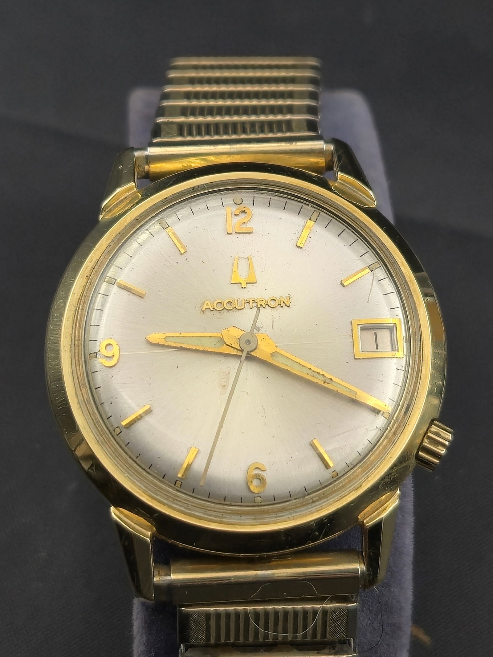 1972 Bulova Accutron GM Assembly Division 25-Year Service Watch, 34mm, 14K Gold-Filled: Offered is a vintage Bulova Accutron presentation watch awarded to Frank W. Carpenter by General Motors Assembly Division for 25 years of service (1949–1974). The case back is engraved with his name