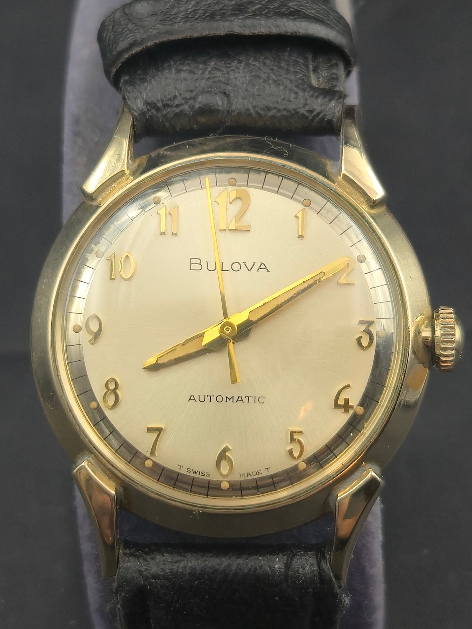 1967 Bulova Automatic 11ALAC 17J Gold-Filled 34mm Wristwatch: A vintage Bulova men’s automatic wristwatch from 1967, housing the Bulova 11ALAC 17-jewel Swiss movement, signed “Bulova Watch Co., Seventeen Jewels, Unadjusted.” The watch features a 34mm c