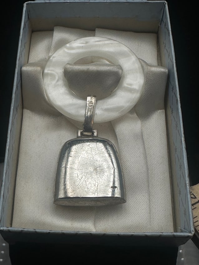 Vintage WEB Sterling Silver Baby Teething Ring with Bell – Original Box: Charming vintage baby teething ring by WEB Sterling. This piece features a white Lucite (plastic) teething ring with a sterling silver bell rattle, both stamped WEB Sterling. Still housed in its origi