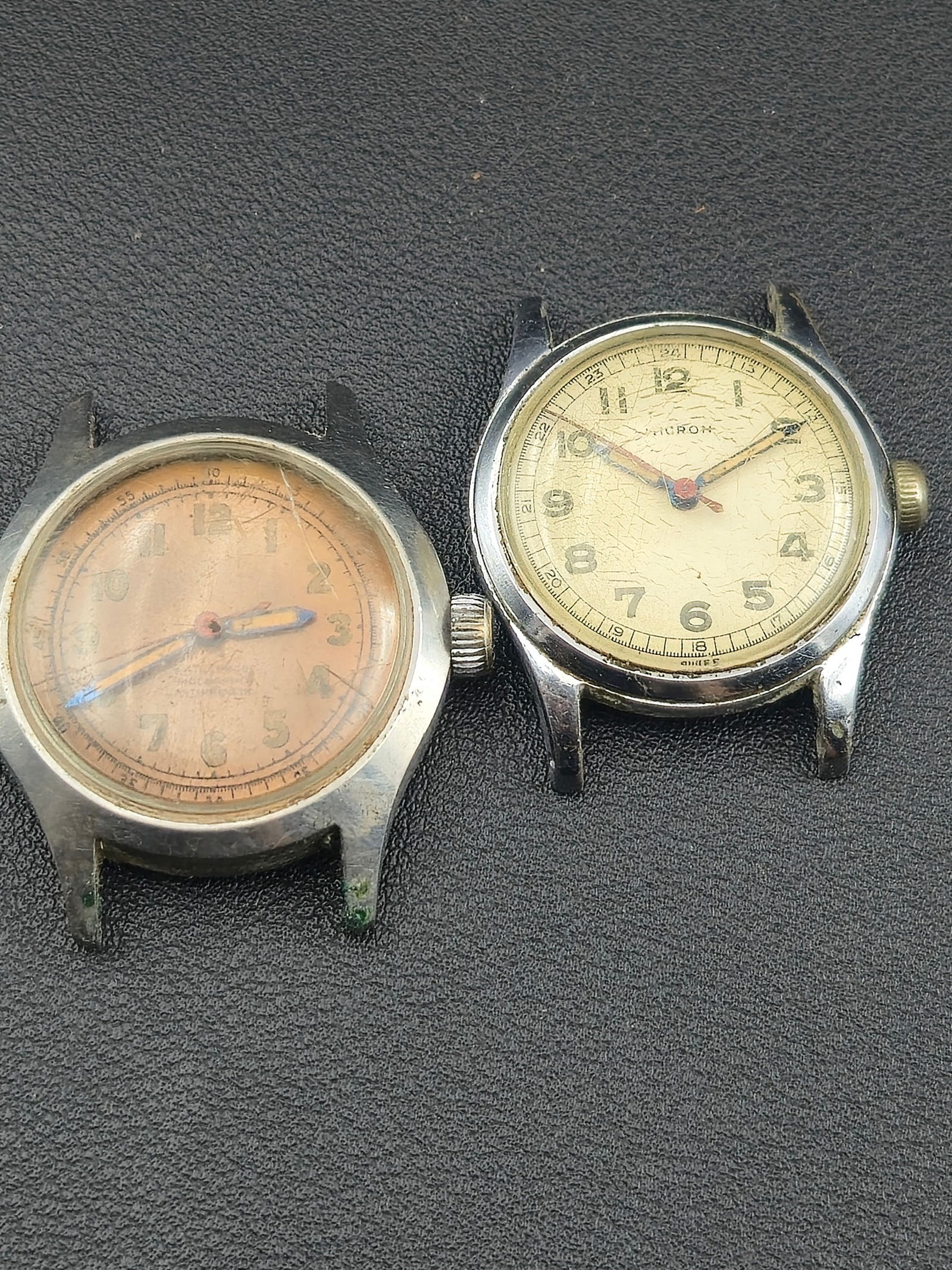 Pair of Vintage Swiss Wristwatches – Pronto Watch Co. & Micron 17J Manual Wind (c. 1940s–50s: Pair of classic Swiss manual-wind wristwatches from the mid-20th century.One bears the Pronto Watch Co. signature with a copper-tone dial marked Waterproof, Shock-Resist, Antimagnetic and houses a 17-