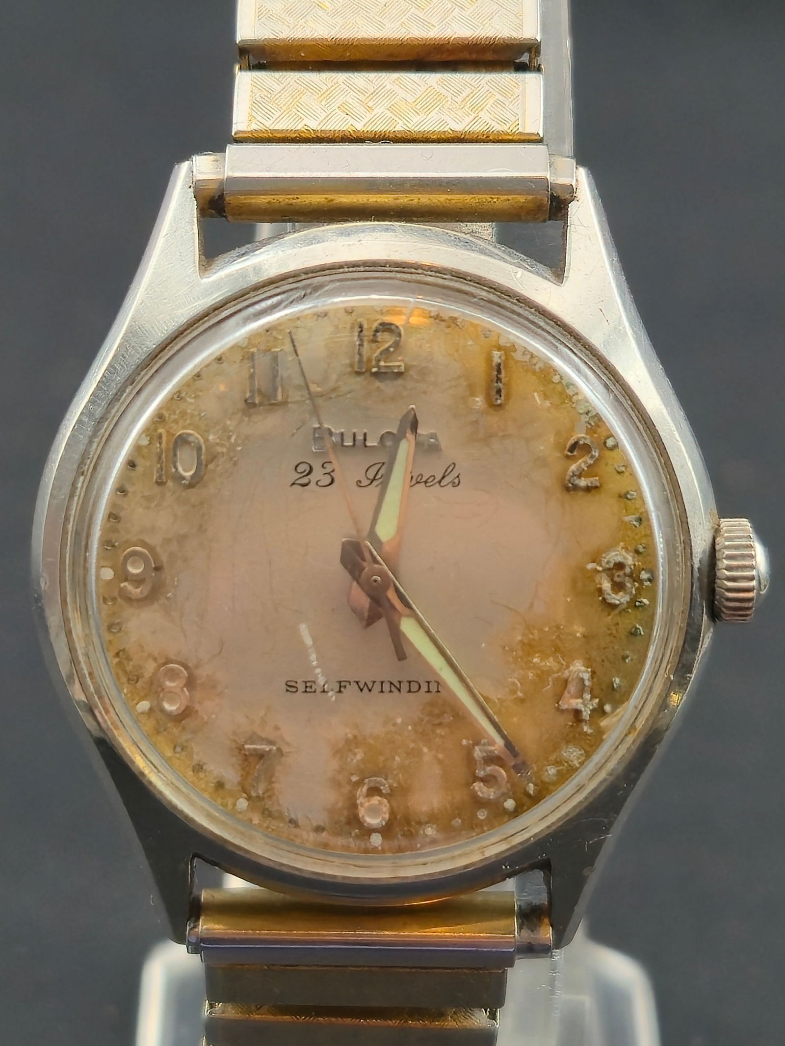 1952 Bulova Selfwinding 23 Jewels Automatic Watch 33.5mm Stainless (Runs): A vintage Bulova men’s wristwatch dated 1952 (case code M2) featuring a stainless steel case measuring 33.5mm. Powered by the Bulova Cal. 10BZAC automatic movement with 23 jewels, marked Bulova U.S.