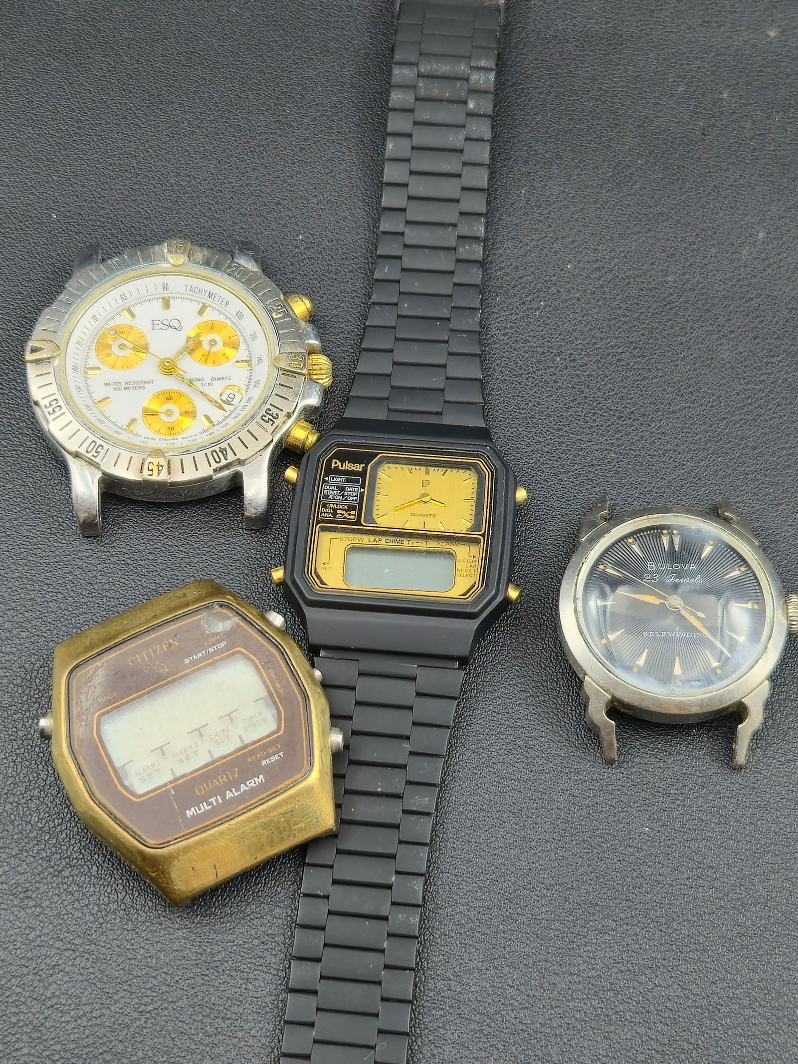 Lot of 4 Vintage Wristwatches – Bulova, Movado ESQ, Citizen, and Pulsar (Untested): A mixed lot of four vintage and modern wristwatches from notable makers, offered untested and as-is. The group includes a 1957 Bulova Selfwinding 23 Jewels, a Movado ESQ quartz chronograph, a Citizen