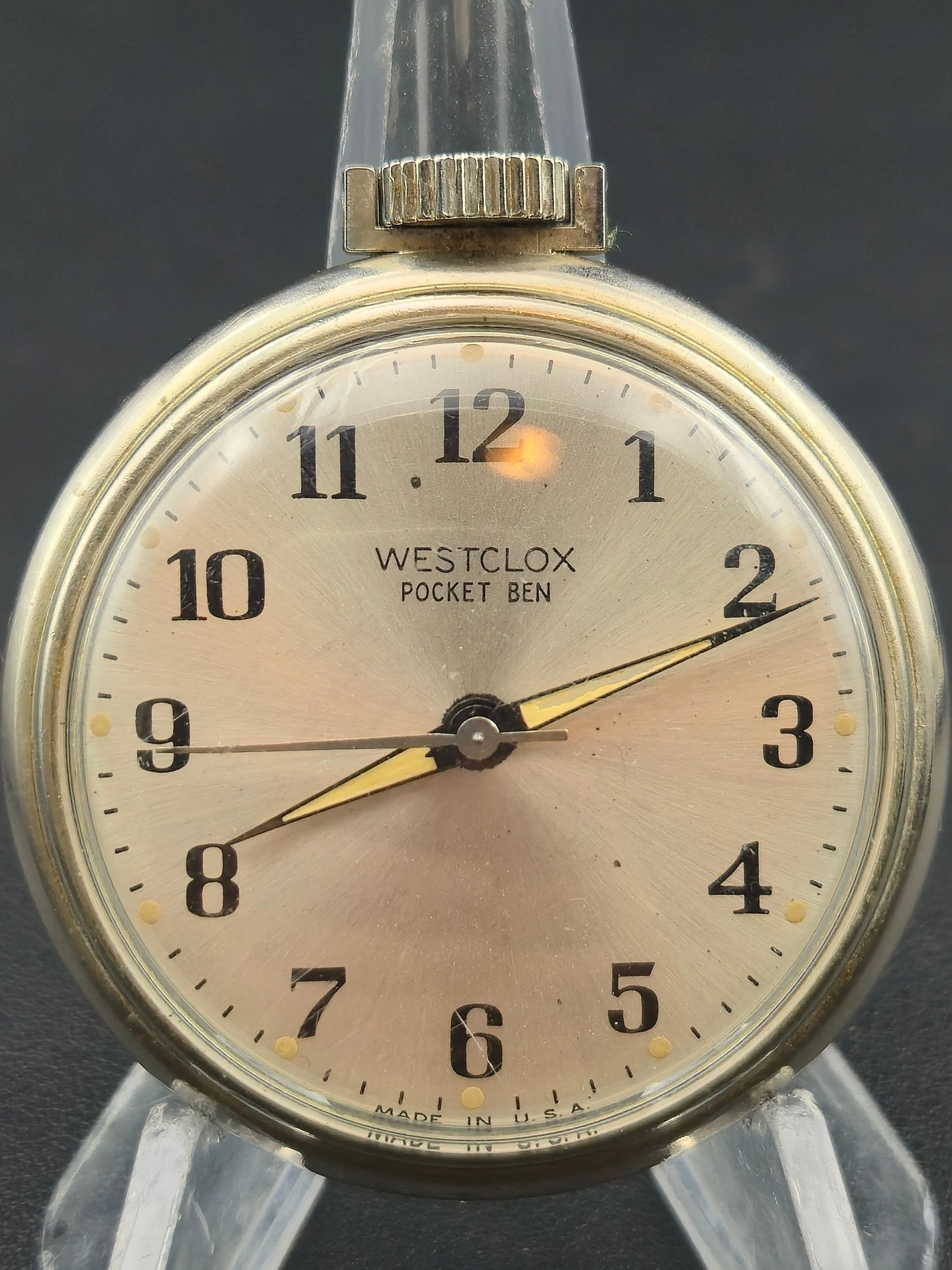 Westclox “Pocket Ben” Pocket Watch – Floral Caseback, U.S. Made, 1950s Era – Running: Charming vintage Westclox “Pocket Ben” pocket watch, produced in the United States circa 1950s.This model features a clean silver sunburst dial with bold Arabic numerals and luminous-style gol