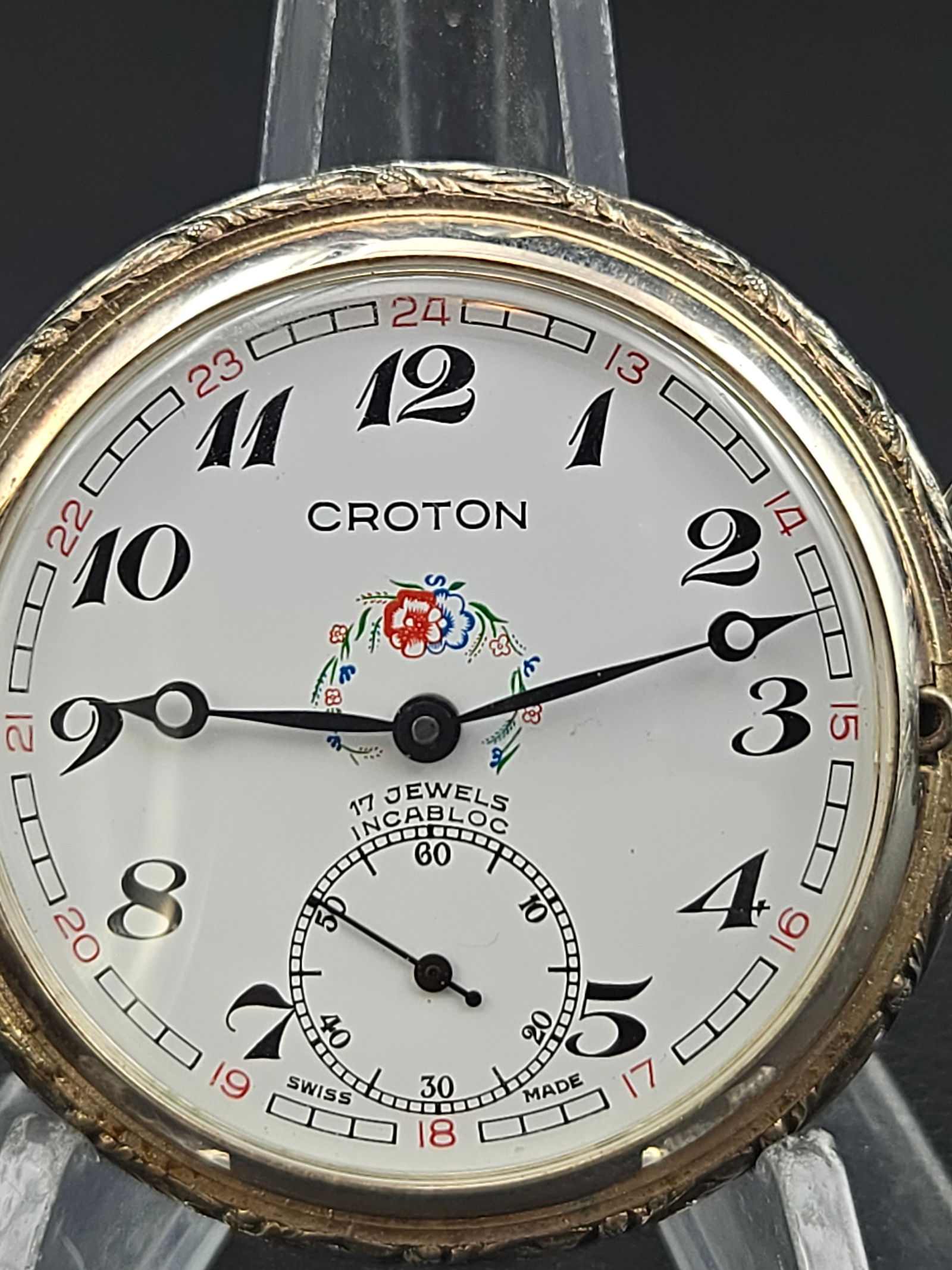 Croton 17J Swiss Pocket Watch – Cortébert Movement, Hunter Case with Fisherman Scene – Running: Elegant vintage Croton 17-jewel Swiss pocket watch, featuring a Cortébert Watch Ltd. Swiss-made movement marked “17 Jewels, Unadjusted” and “Croton Time Corp.” on the bridge. Cortébe