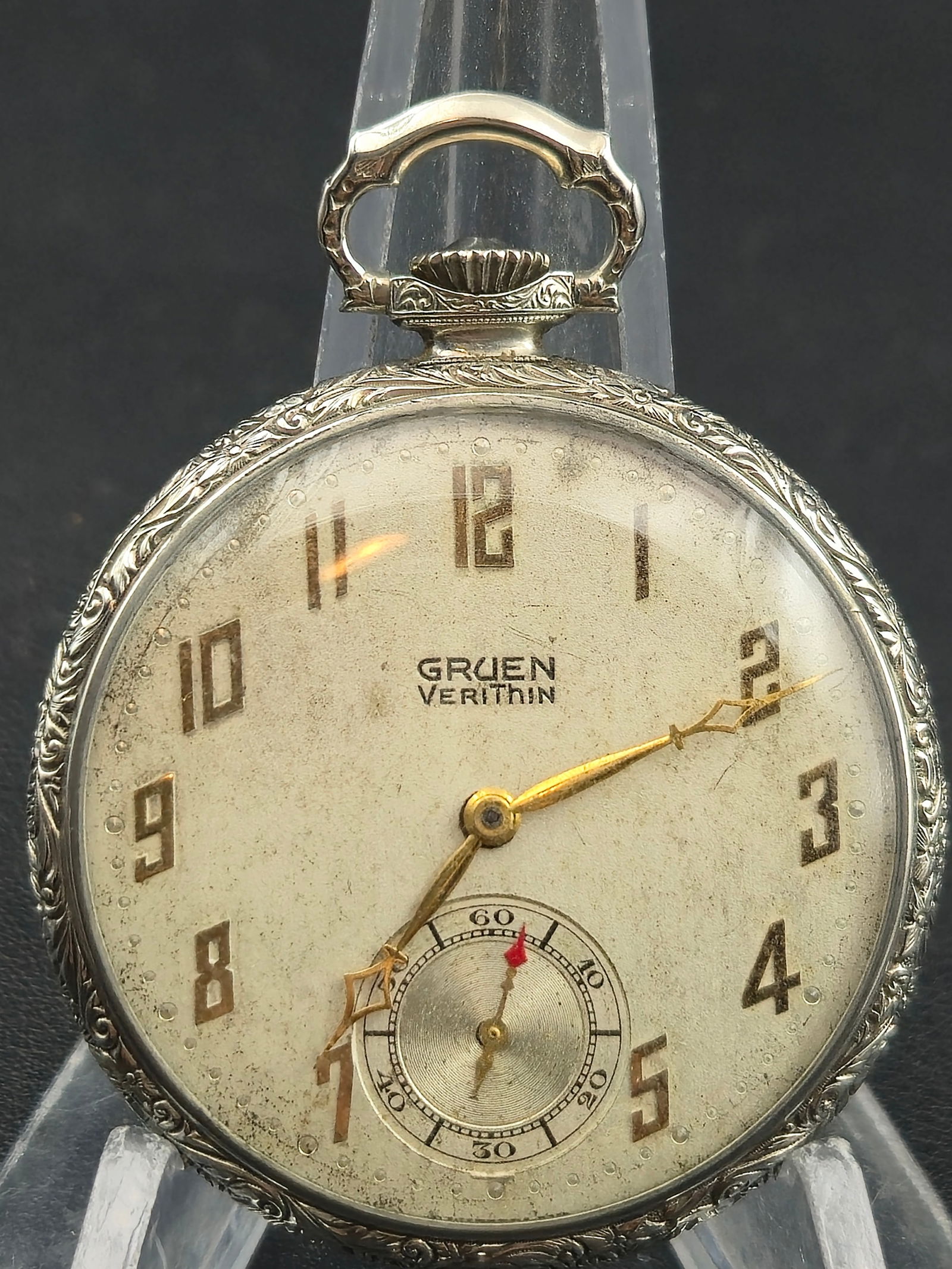 Gruen VeriThin 17J Swiss Pocket Watch, White Gold-Filled Wadsworth Case – Runs: Elegant Gruen VeriThin Swiss pocket watch, circa 1930, featuring a 17-jewel adjusted movement housed in an ornate white gold-filled Wadsworth case engraved with floral detail around the bezel and bow.