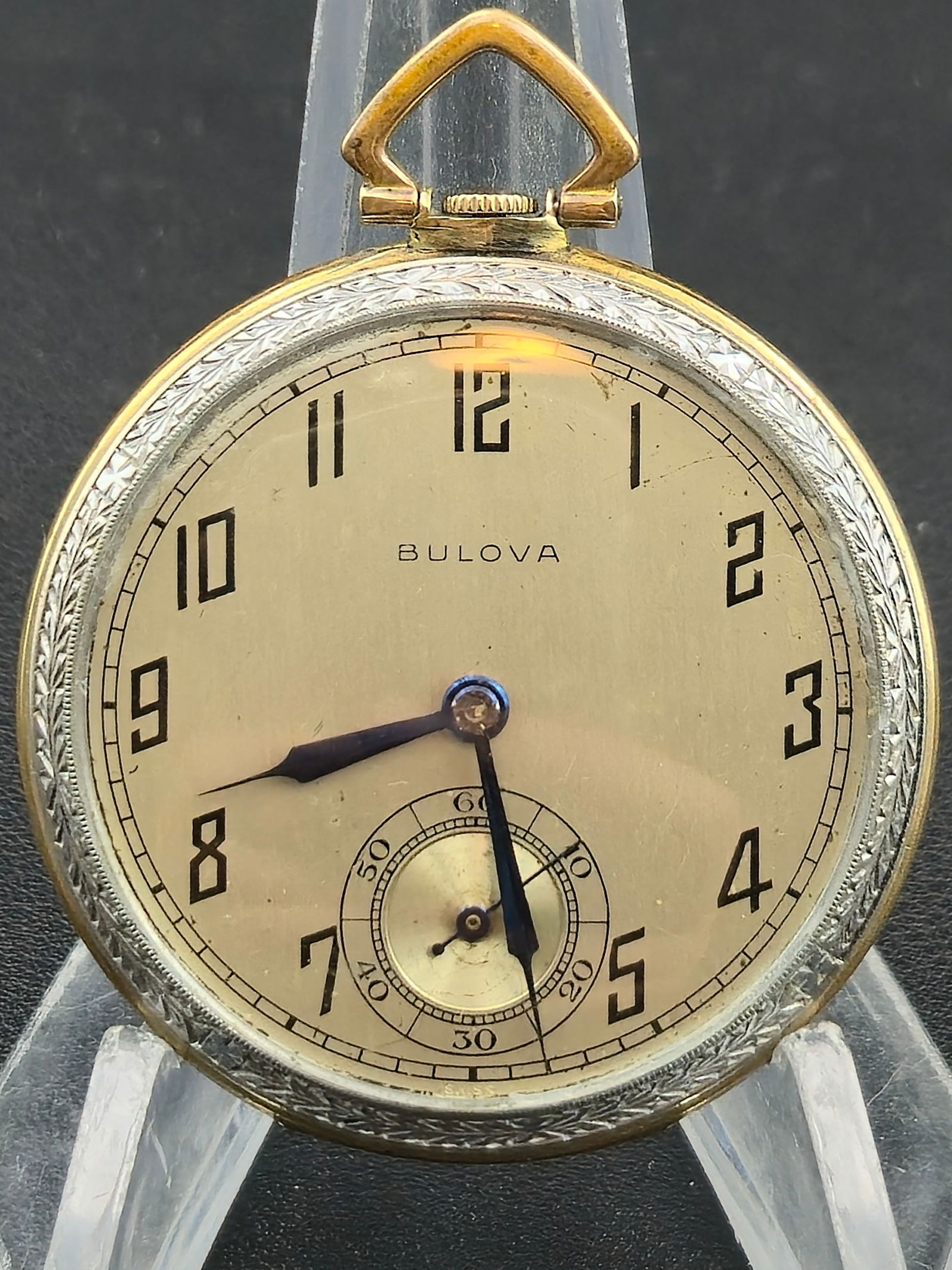 Bulova Swiss 17J Pocket Watch, Cal. 17AB Two-Tone Engraved Case – Runs: Elegant Bulova Swiss-made pocket watch, circa late 1930s–1940s, powered by a finely finished 17-jewel manual-wind movement (Cal. 17AB). The movement is marked Bulova Watch Co., Swiss, Seventeen 17 J