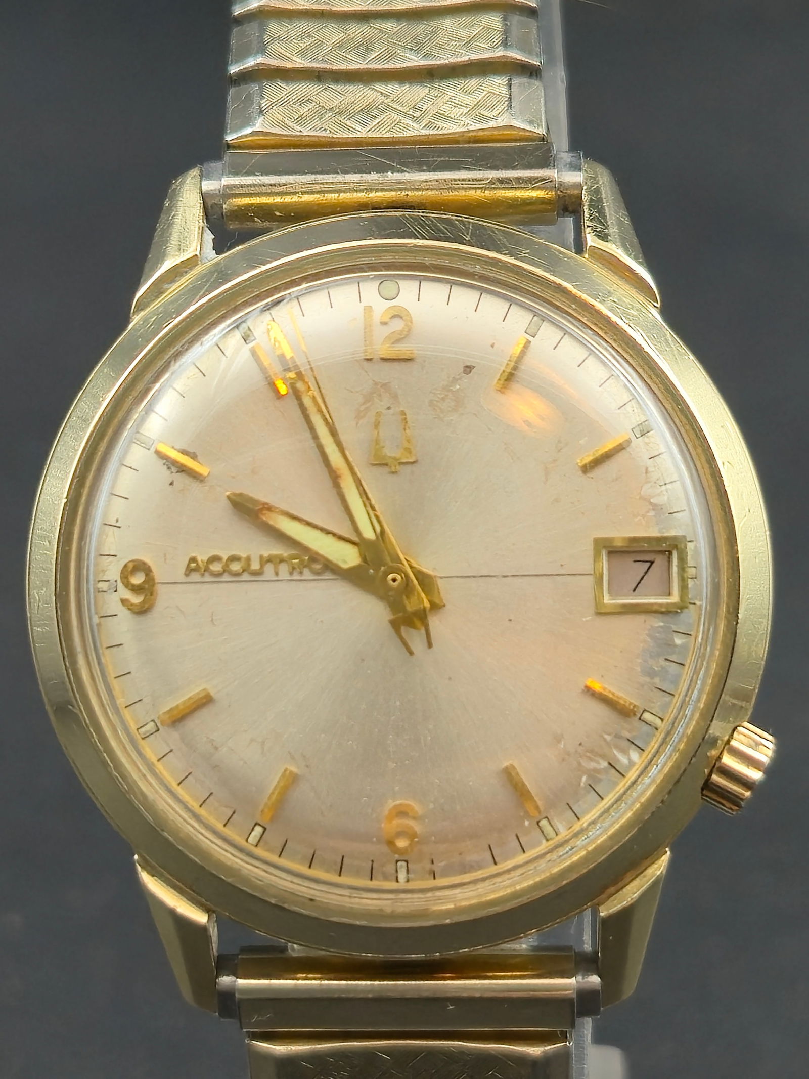 Bulova Accutron 2181 Tuning Fork 14K Gold-Filled Wristwatch (1969, 33.7 mm, Running): Vintage Bulova Accutron wristwatch powered by the Caliber 2181 tuning-fork movement, one of Bulova’s most refined and reliable electronic designs. The elegant silver sunburst dial features applied g