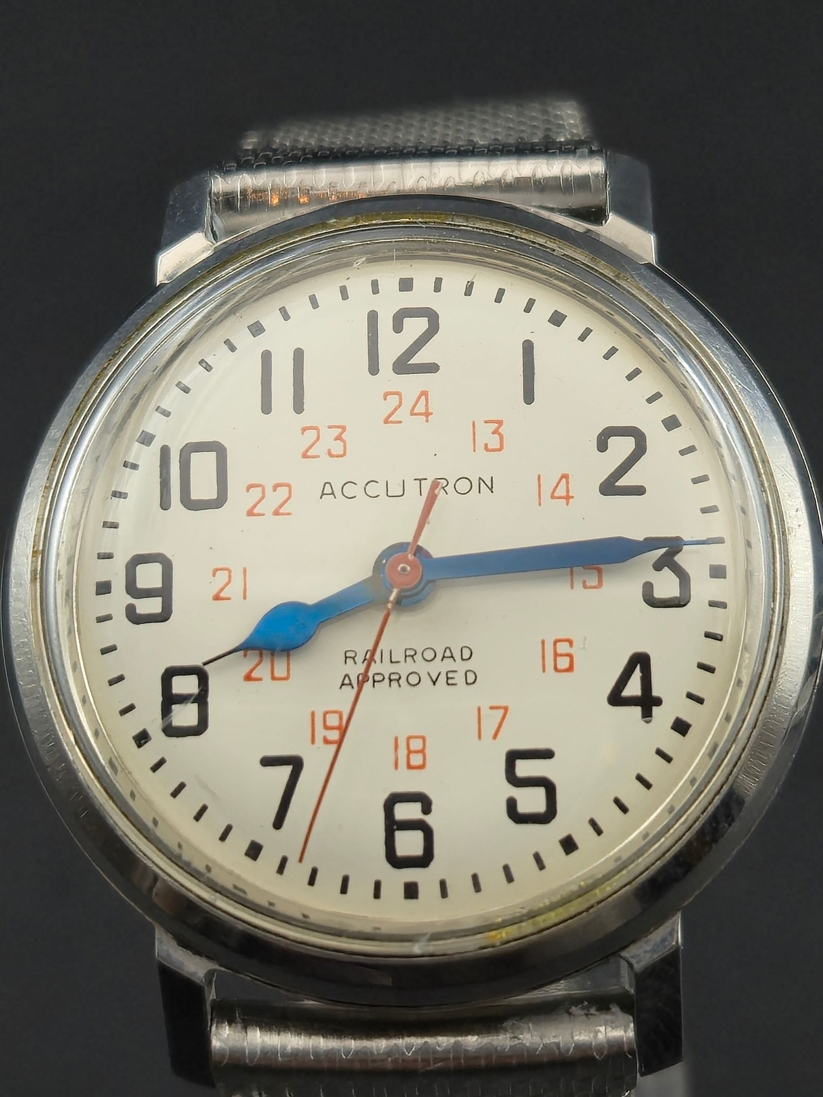 Bulova Accutron 214H Swiss “Railroad Approved” Tuning Fork Watch (1966, 34.8mm, Running): Highly collectible Bulova Accutron 214H wristwatch featuring the Swiss-made tuning-fork movement with gilt gold lettering—an export-grade model built to the highest accuracy standards. The crisp whi