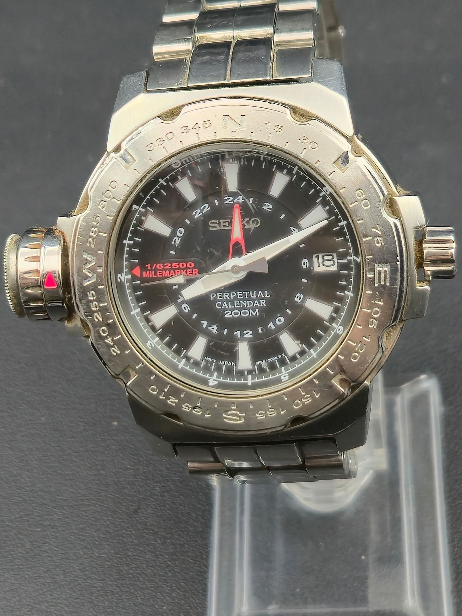 Seiko 8F56-0040 “Milemarker” 42 mm Stainless Perpetual Calendar GMT 200 M Watch Runs: rugged and functional Seiko “Milemarker” Perpetual Calendar GMT, reference 8F56-0040, designed for adventurers and divers alike.Powered by Seiko’s 8F56 high-accuracy quartz movement, this wa