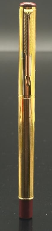 Vintage Parker “51” Gold-Filled Fountain Pen, Burgundy Barrel, 14K Gold Nib, c.1940s–50s: Elegant vintage Parker “51” fountain pen, featuring a gold-filled cap with fine ribbed pattern and burgundy (cordovan brown) barrel. The pen is fitted with Parker’s signature hooded 14K gold