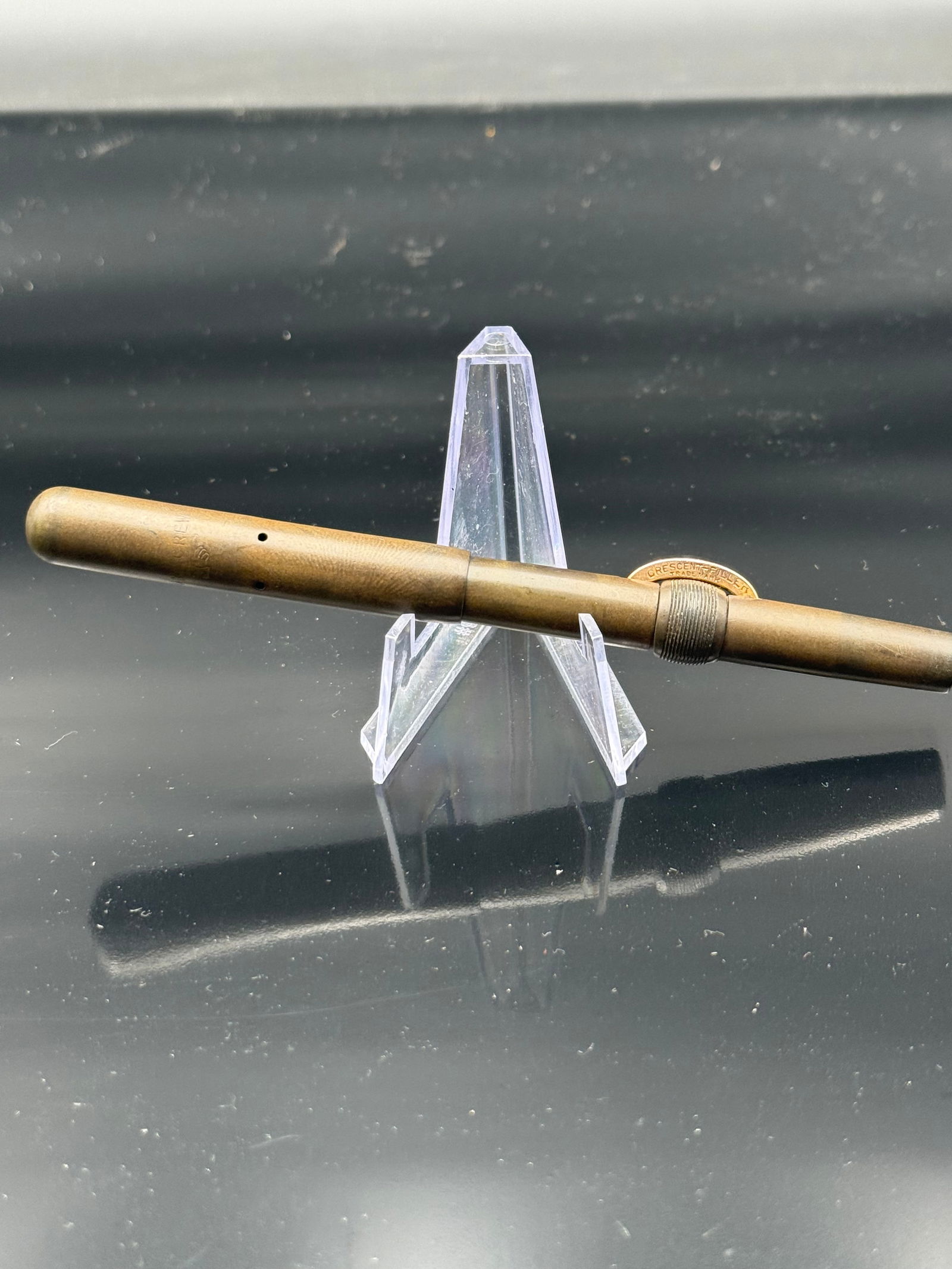 Conklin Crescent Fill, clip less Fountain Pen: In 1891, Roy Conklin received a patent for his fountain pen design. Later, in 1898, he began the Conklin Pen Company in Toledo, Ohio. During 1916, the pen innovator produced a spring-loaded pocket cli