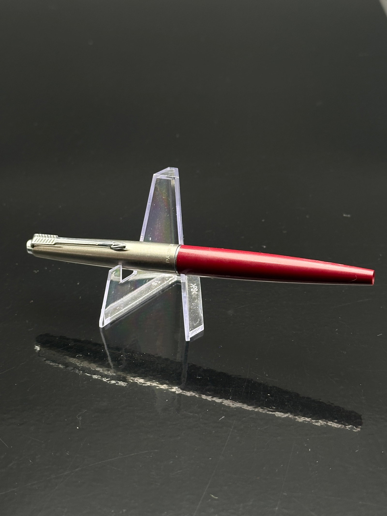 Vintage Parker 45 Classic Fountain Pen, Red Barrel with Brushed Steel Cap, c.1960s: A vintage Parker 45 Classic fountain pen, produced in the 1960s–1970s. Features a red barrel with stainless brushed steel cap and chrome arrow clip engraved “PARKER.” Fitted with a gold-plat