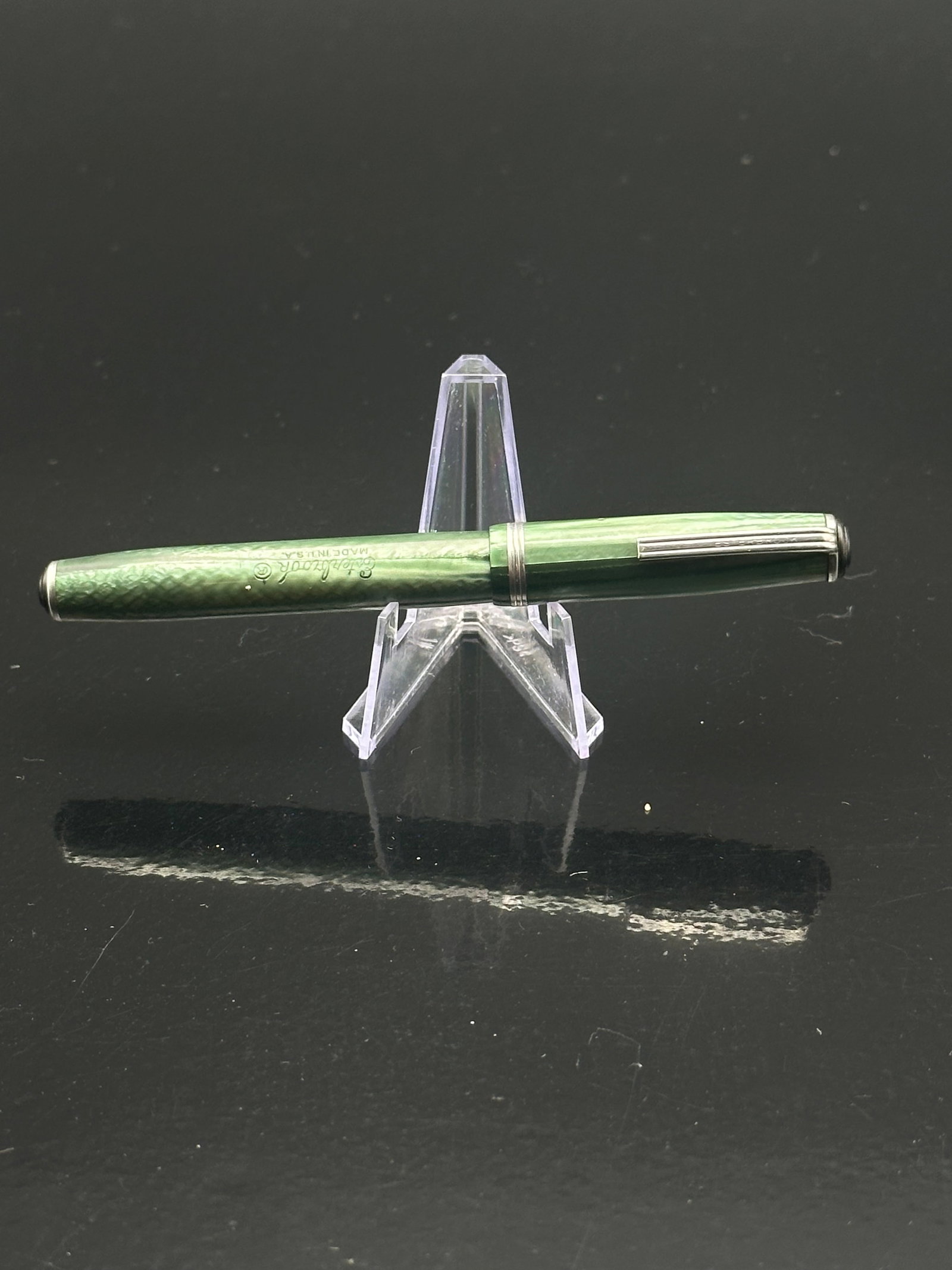 Esterbrook J Series fountain pen: Vintage Esterbrook J Series fountain pen in light green marbled celluloid, made in the U.S.A. The pen features a stainless steel 2556 Renew-Point nib (Firm Fine Writing) and a chrome clip and cap band