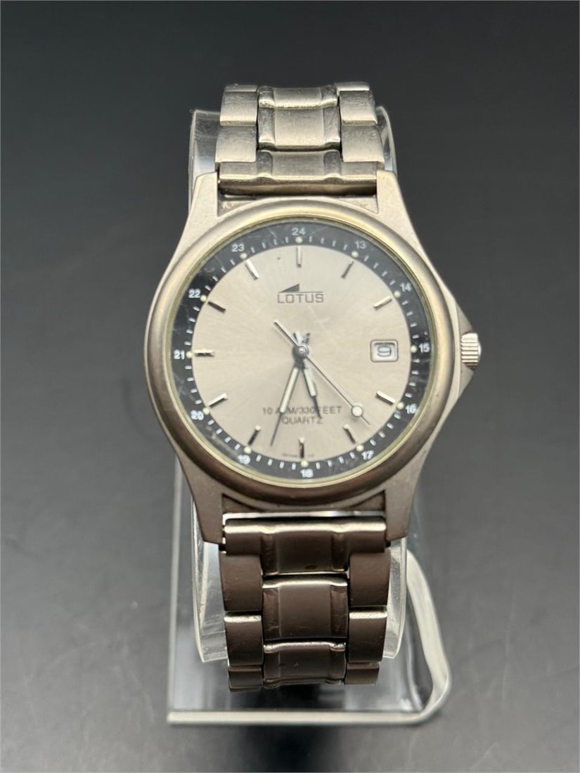 LOTUS gray Stainless Steel Men’s watch: Brand: LOTUS• Movement: Quartz (battery-powered)• Water Resistance: Marked “10 ATM / 33 FEET,” which means it is water-resistant up to 100 meters. Suitable for swimming and snorkelin