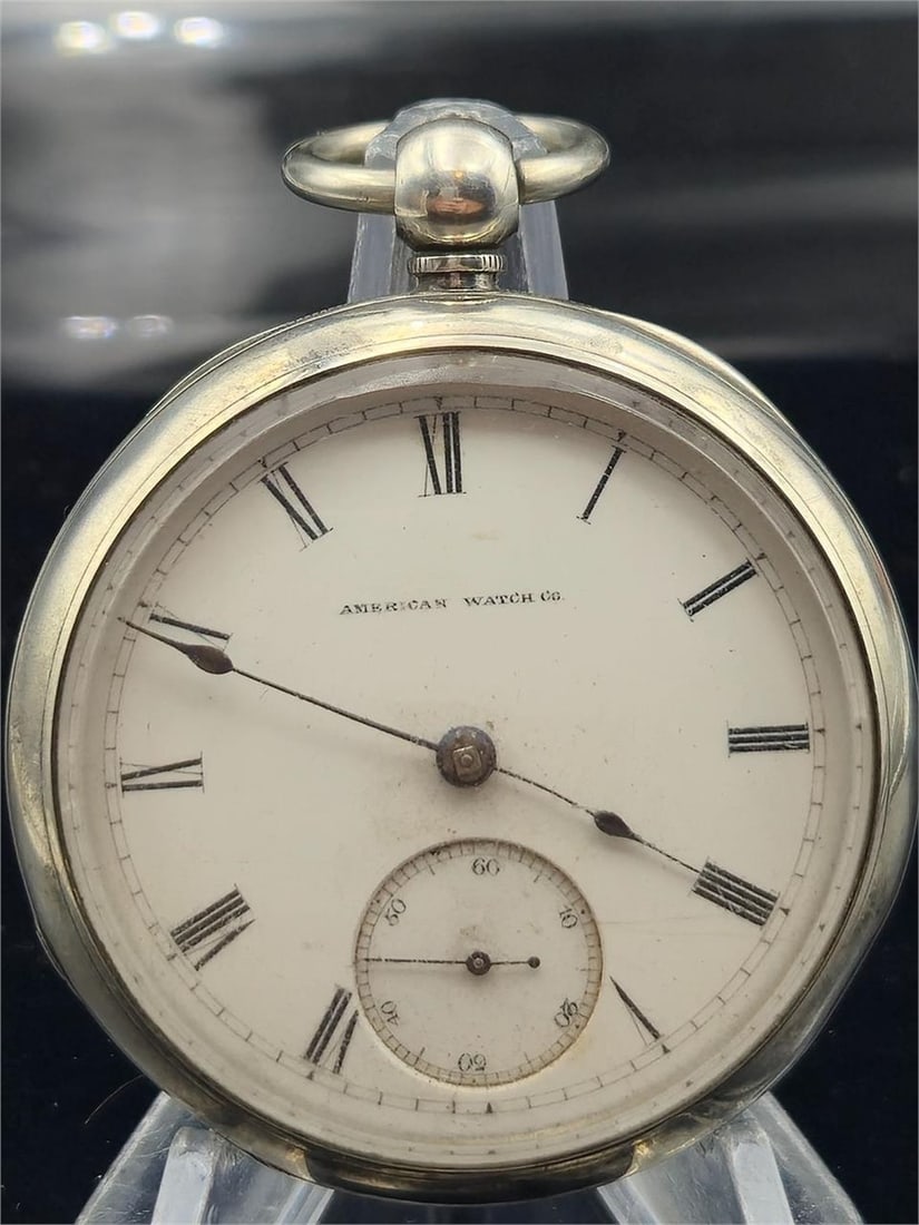 1876 Waltham P.S. Bartlett 18s Coin Silver: This antique American Waltham P.S. Bartlett Grade pocket watch features an 18-size key-wind, key-set movement with 11 ruby jewels. The serial number 952461 dates the watch to approximately December 18