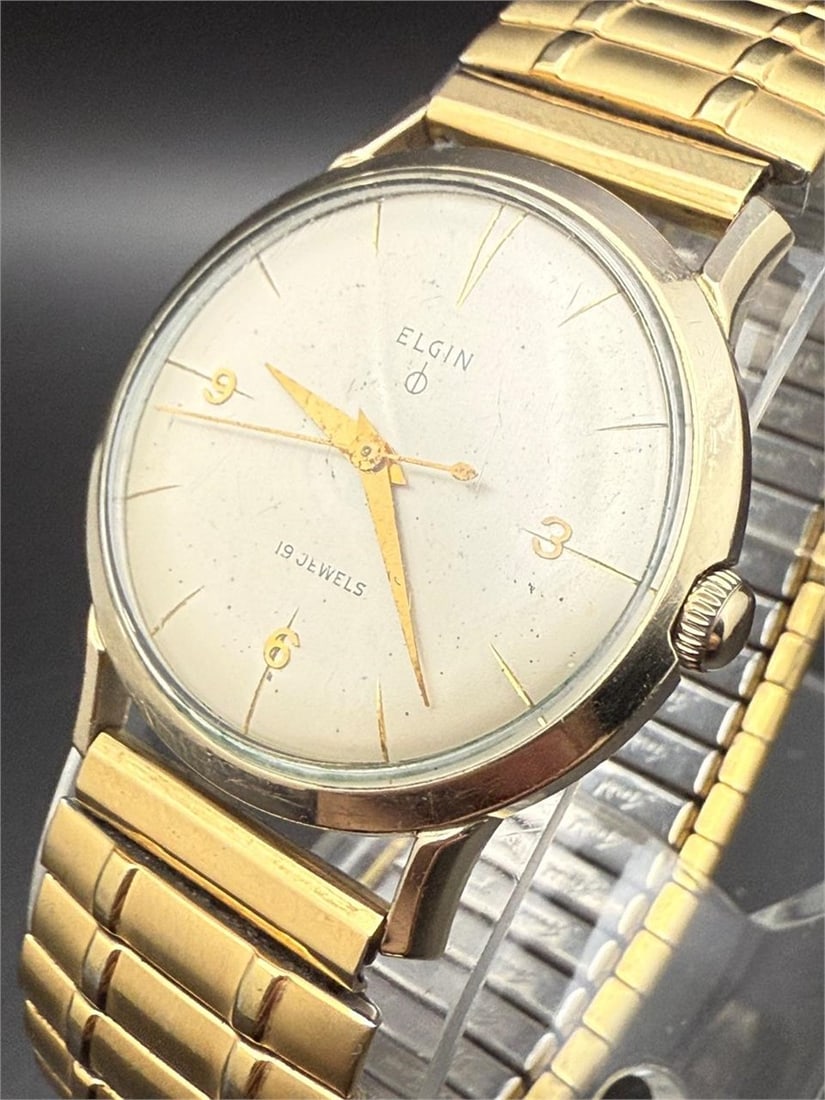 950s Elgin Durabalance 10k RGP 752 Dress Watch: Running condition.The watch is sold as-is in current condition.Thank you for viewing this auction. We are a dedicated team of vintage watch and antique enthusiasts with years of experience in collecti