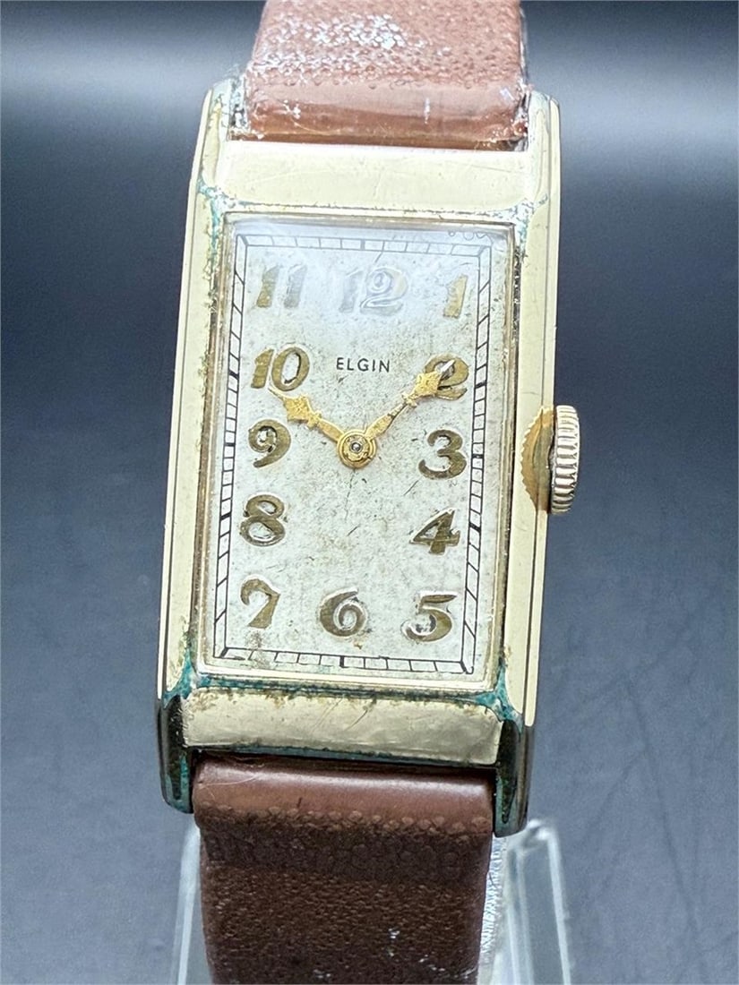 Vtg Elgin Elongated Curved GF Dress Watch: 10k gold filled caseRunning condition.The watch is sold as-is in current condition.Thank you for viewing this auction. We are a dedicated team of vintage watch and antique enthusiasts with years of ex
