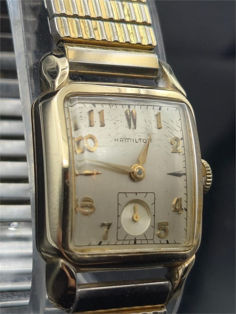 1950s Hamilton Fulton – 10K Gold-Filled Watch: Vintage 1950s Hamilton “Fulton” men’s wristwatch featuring a 10K gold-filled case and classic mid-century styling. Powered by a Hamilton in-house manual wind movement, this model features a