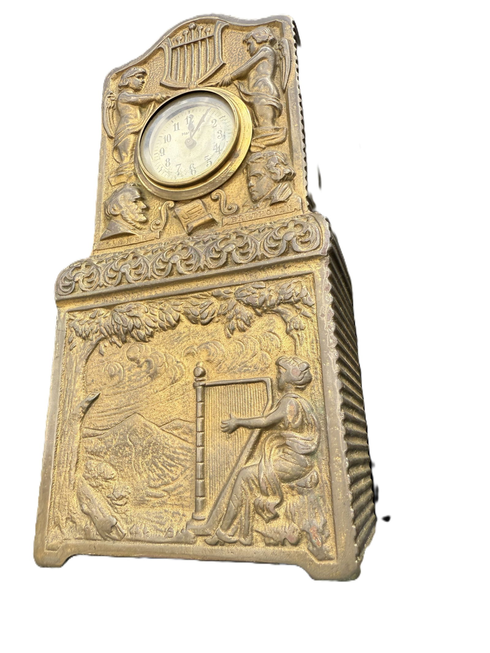 Antique Art Nouveau Sessions Mantel Clock & Music Box In Cast Metal Case with Musical Motif, c.: Elegant early 20th-century Art Deco Sessions mantel clock featuring a detailed cast metal case with embossed cherubs, musical instruments, and portrait medallions of Beethoven and Wagner. The design s