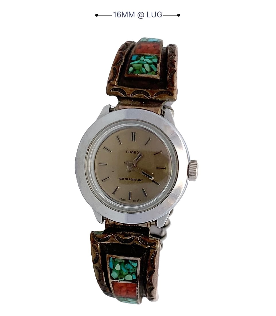 Vintage Timex Water Resistant Watch with Navajo Turquoise & Coral Chip Inlay Band: A vintage Timex wristwatch accented with Native American Navajo-style sterling silver terminals, beautifully decorated with turquoise and coral chip inlay framed in detailed silverwork. The combinatio