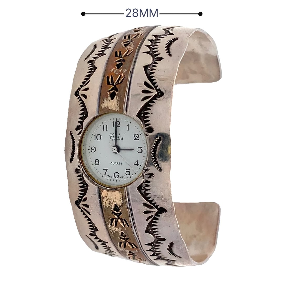 Vintage Navajo Sterling Silver & Brass Overlay Cuff Watch – 28mm: Handcrafted Navajo sterling silver and brass overlay cuff watch featuring intricate stamped patterns and geometric designs. Set with a Media Quartz movement. Natural patina, untested, good vintage con