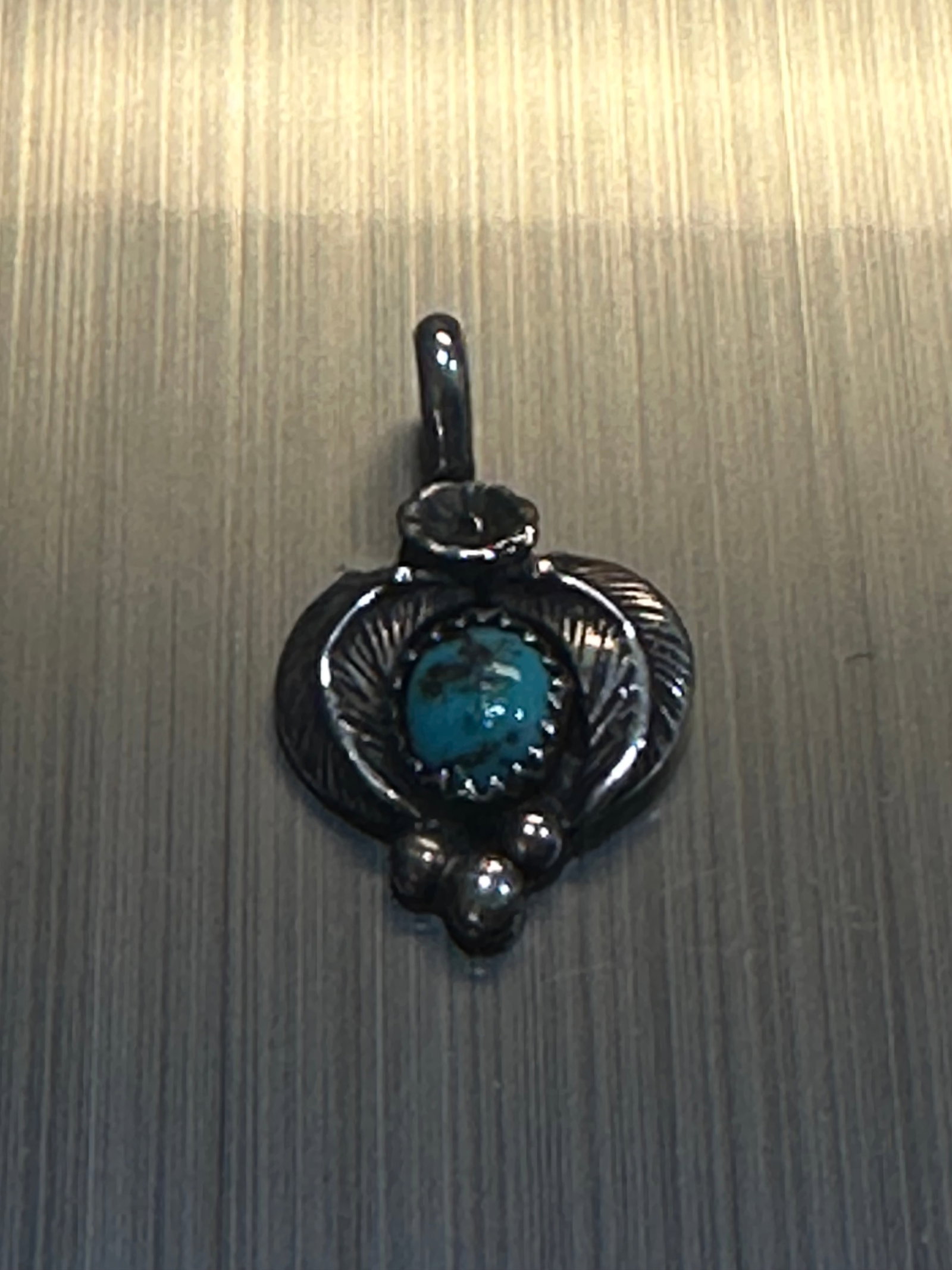 Sterling Silver Whale Tail Pendant, Marked 925: Solid sterling silver whale tail pendant with smooth polished finish, marked “THAILAND 925” on the reverse. This minimalist ocean-inspired piece represents strength and freedom, perfect for be