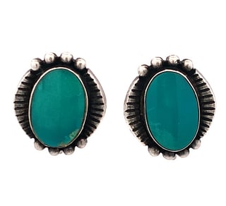 Navajo Sterling Silver Turquoise Oval Earrings, 5.5g: Navajo sterling silver stud earrings with oval turquoise cabochons in traditional rope and bead design. Marked Sterling and 32 77. Measure 16.5 × 14.5 mm, total weight 5.5 grams.