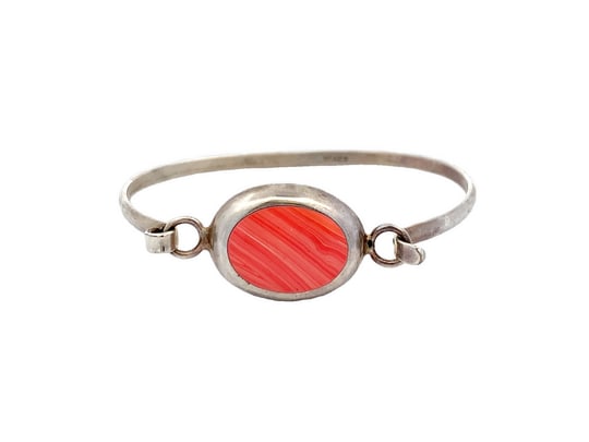 Vintage Mexican Sterling Silver & Coral Cabochon Bracelet, 10g: Delicate vintage Mexican sterling silver bracelet featuring a striking oval coral cabochon bezel-set at the center. The simple yet elegant hinged design highlights the stone’s warm reddish hue again