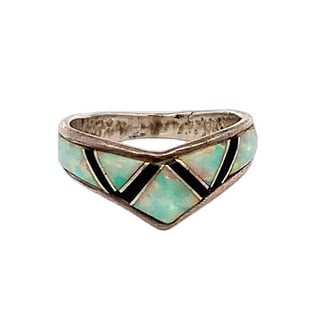 Sterling Silver Lab Opal and Onyx Inlay Chevron Ring, 2.5g, Size 6.75: Delicate sterling silver chevron band featuring lab-created opal and onyx inlay in a geometric pattern. The opal displays vibrant flashes of blue and green, accented by sleek black onyx segments. Mark