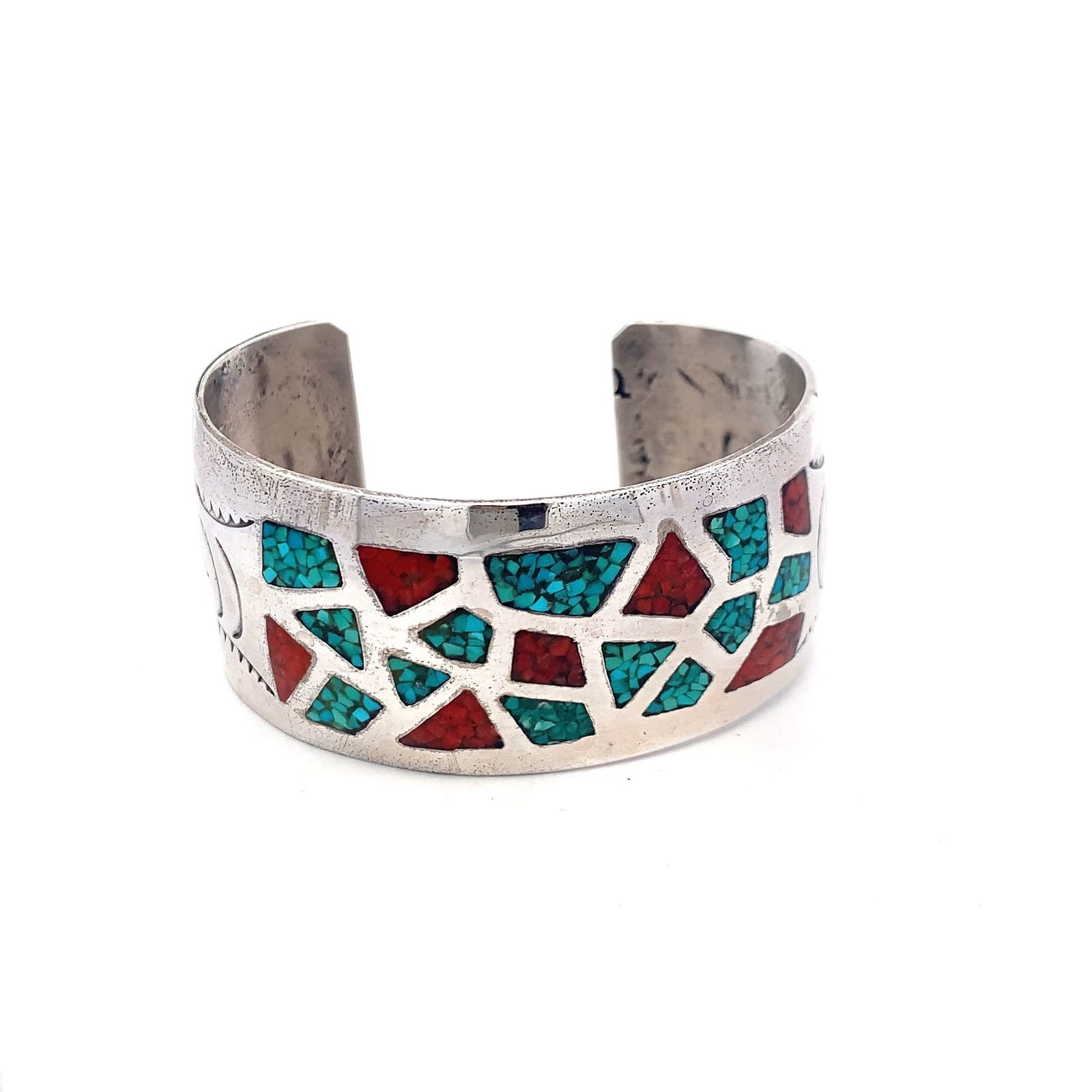 NATIVE AMERICAN NAVAJO CORAL TURQUOISE INLAY STERLING SILVER BRACELET: 50 grams5,25" inside1.25" wide Paper Stamp"Indian Ruins