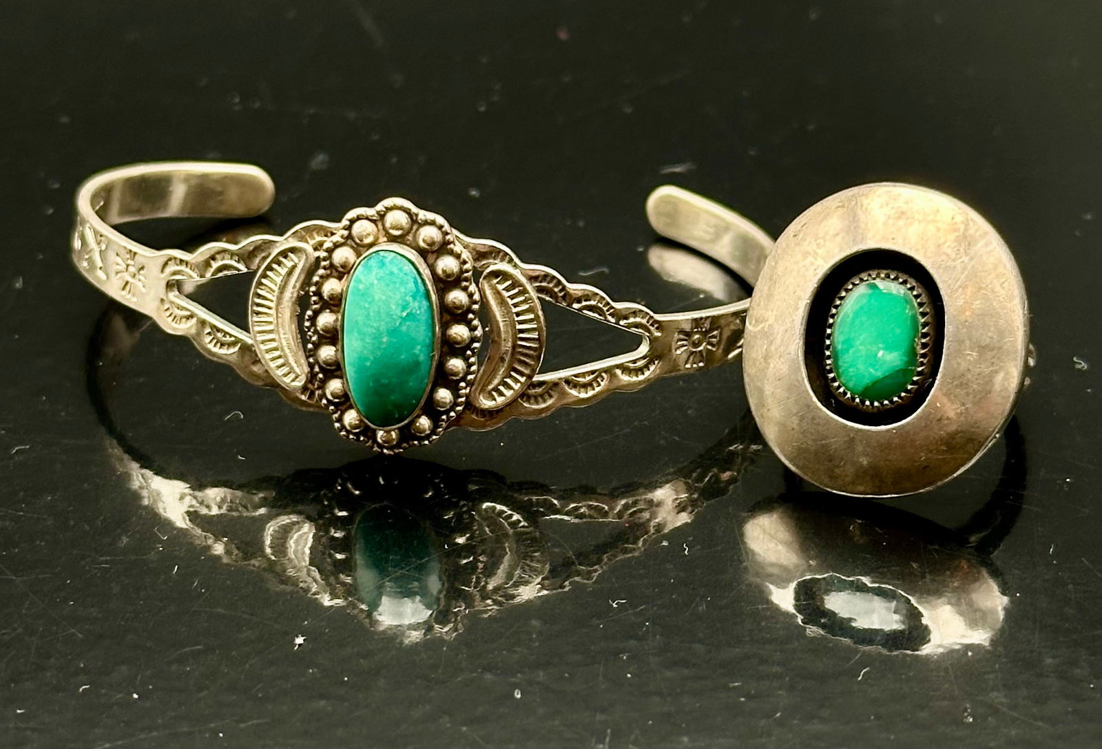 Vintage Navajo Sterling Silver Turquoise Cuff Bracelet Pair, Hand Stamped, 19g: Two vintage Navajo sterling silver cuff bracelets featuring beautiful turquoise cabochons. One bracelet showcases a detailed hand-stamped design with beadwork framing a central turquoise stone, while