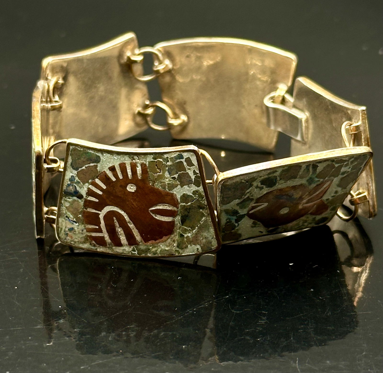 Vintage Los Castillo Mexico Sterling & Inlaid Stone Bracelet, 45g: Striking vintage sterling silver bracelet by Los Castillo, Taxco, Mexico — a renowned silversmith workshop known for its exceptional mid-century designs. The bracelet features six linked panels, eac