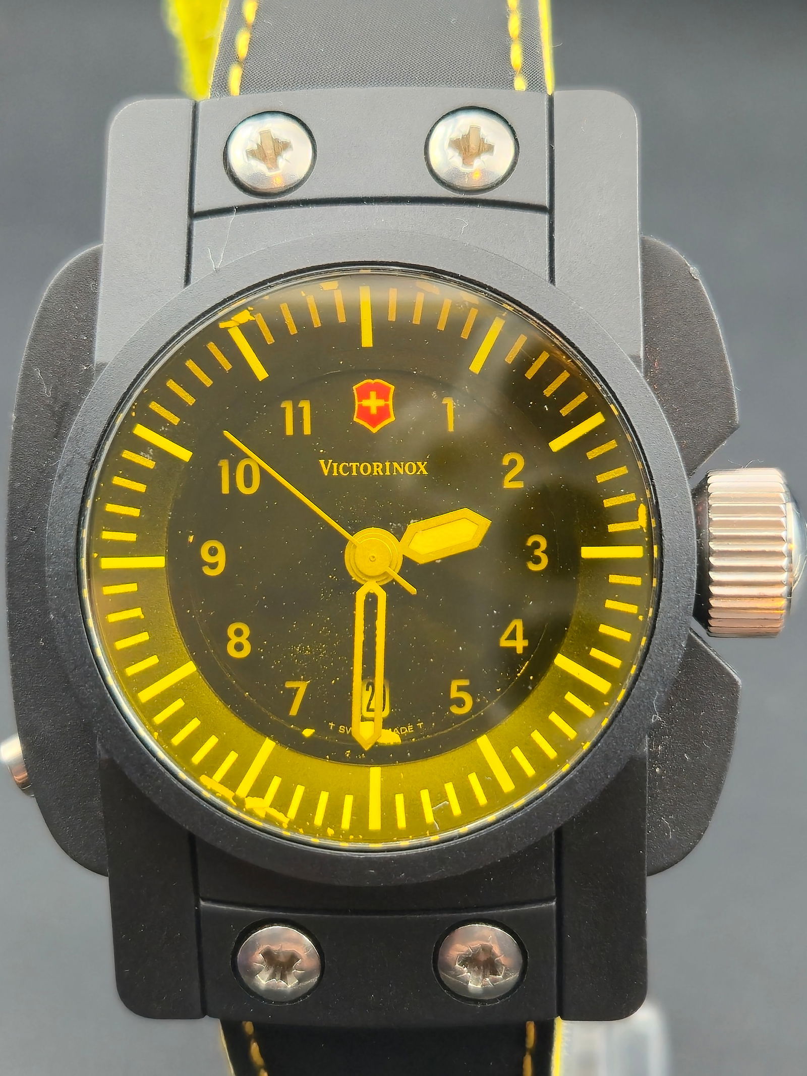 Victorinox Swiss Army Quartz Black-Yellow Pilot Watch (46 mm, Stainless Caseback: Large and bold Victorinox Swiss Army quartz pilot-style wristwatch with a black dial featuring bright yellow numerals, hands, and inner minute track. The brushed black case measures approximately 46.8