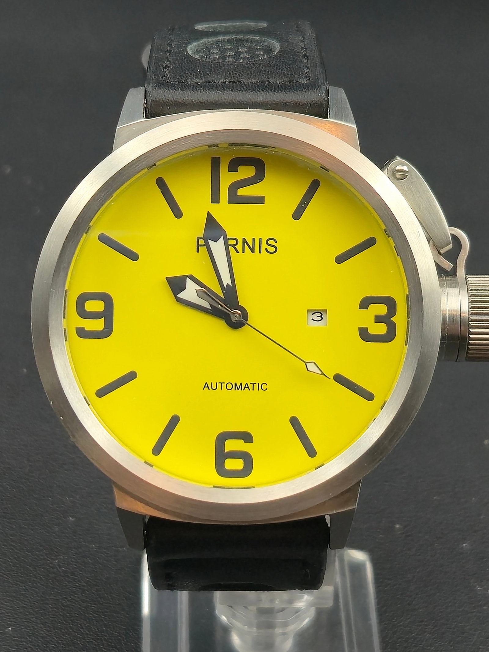 Parnis Automatic Pilot 50mm Yellow Dial Stainless Steel NOS (Model 763/2813): New old stock (NOS) Parnis automatic wristwatch featuring a striking yellow dial with bold black Arabic numerals and luminous sword hands. The large 50 mm stainless-steel case includes a distinctive s
