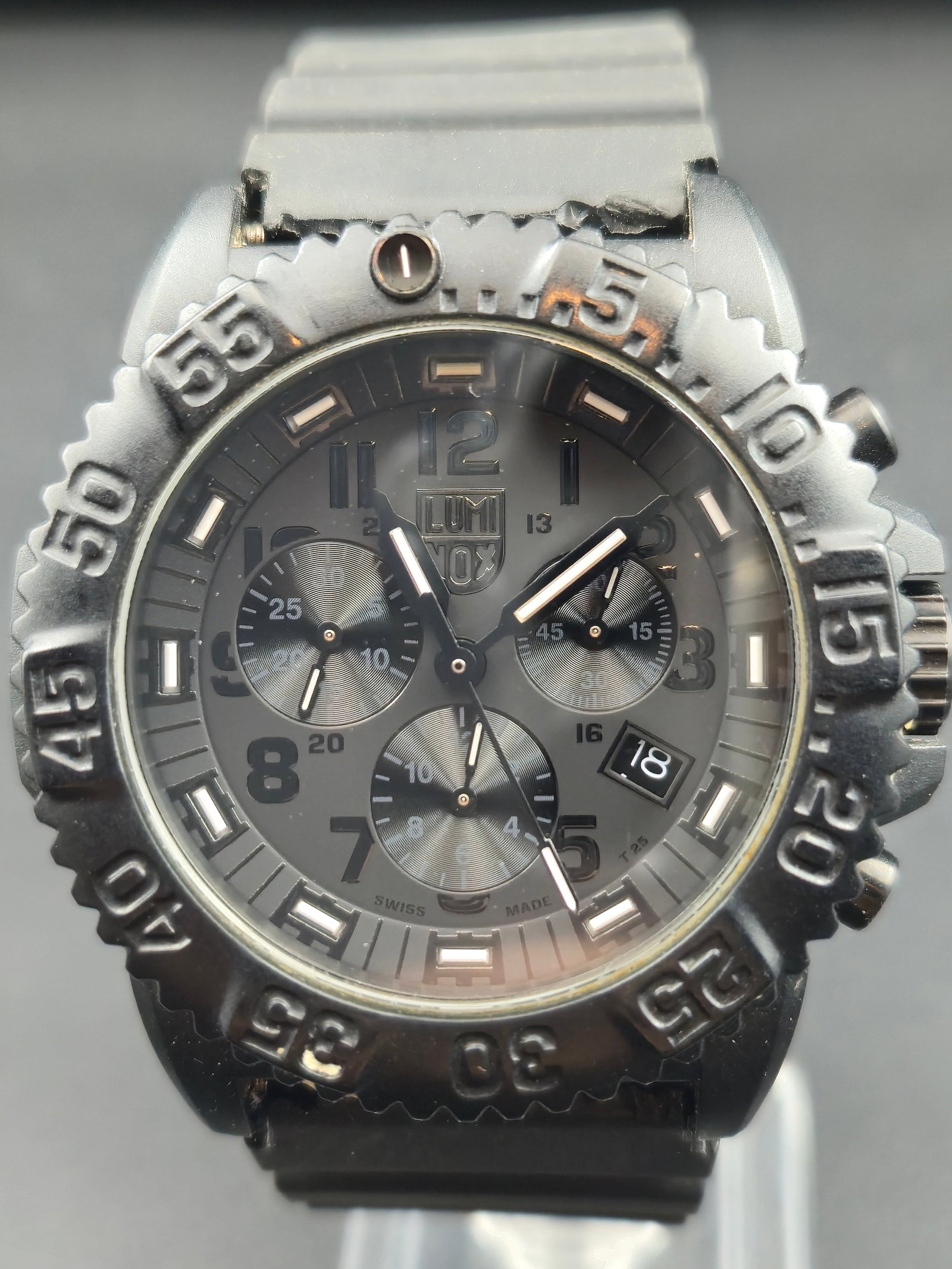 Luminox Navy SEAL Chronograph 3080 Series 48mm Carbon Case Swiss Made: Swiss-made Luminox Navy SEAL 3080 Series chronograph featuring a blacked-out tactical design with luminous tritium gas tubes for continuous visibility. This large 48 mm diver-style watch has a lightwe