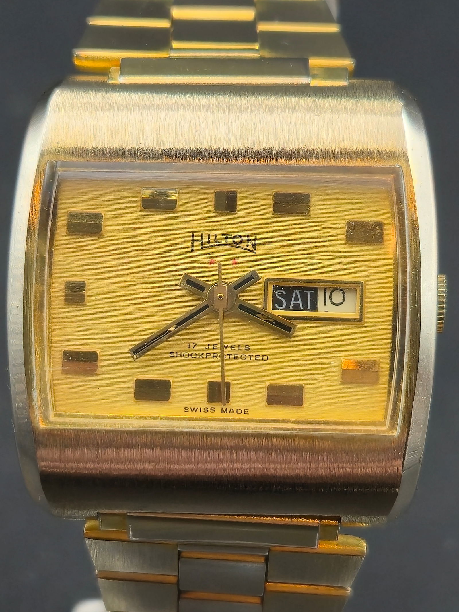 Hilton Swiss 17J Day-Date Automatic Gold-Tone Rectangular 34 mm Watch (c.1970s) – Runs (1 of 10)